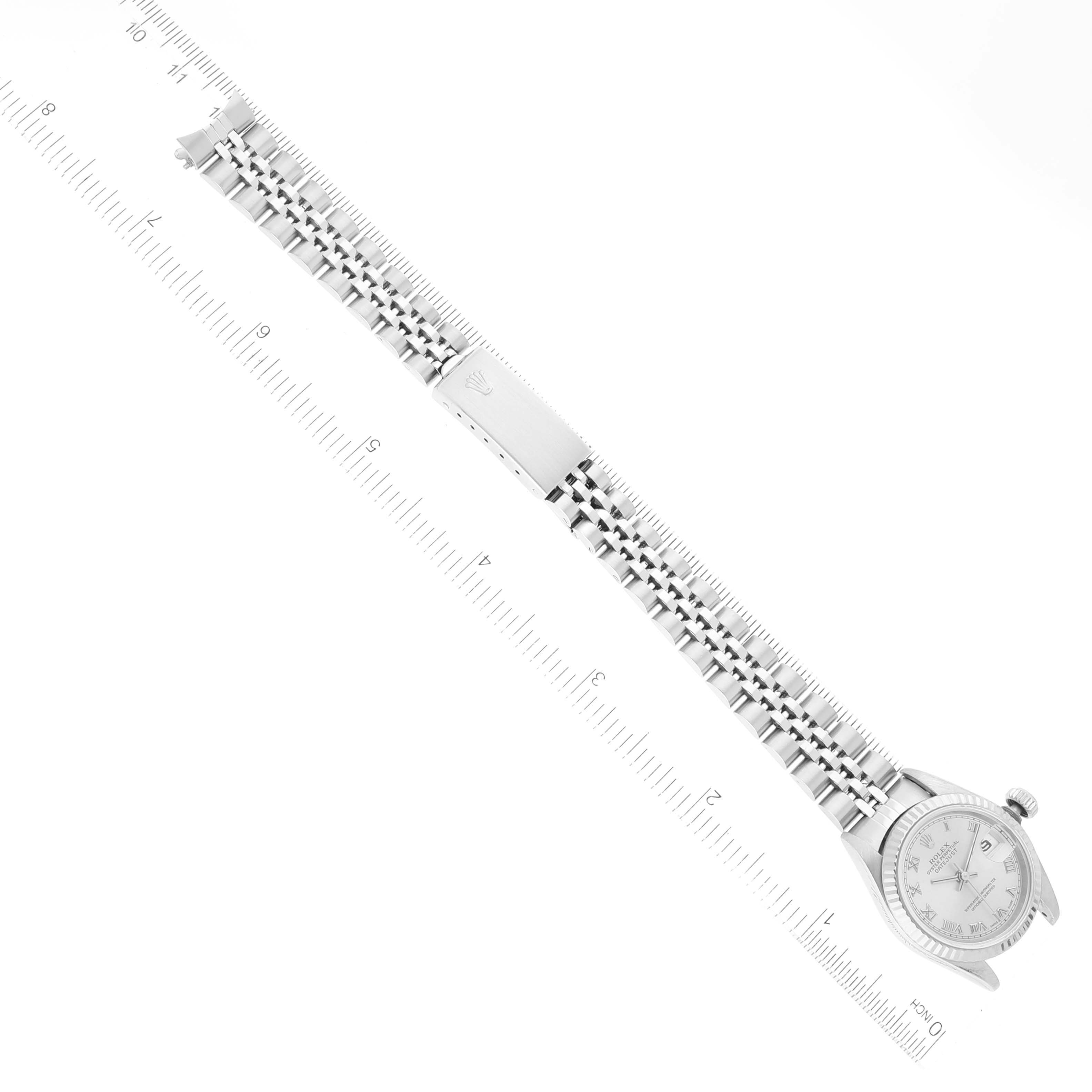 The image shows a diagonal top view of a Rolex Datejust 69174 Women's Stainless Steel Silver Dial 69174 Women's Stainless Steel Silver Dial watch, highlighting its bracelet and partially visible dial.