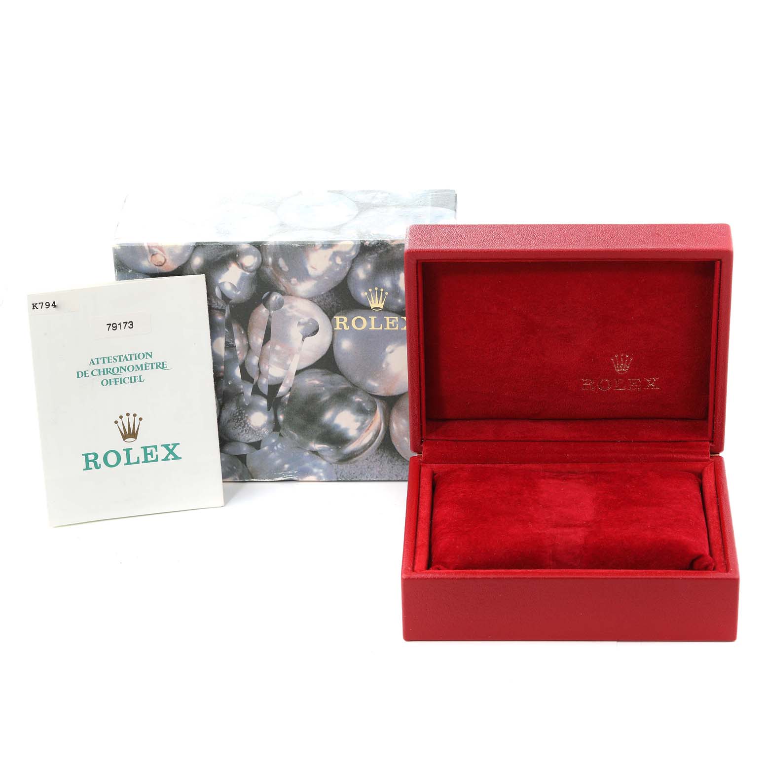 This image shows the packaging and certification of a Rolex Datejust 79173 Women's Steel and Gold (two tone) Champagne Dial 79173 Women's Steel and Gold (two tone) Champagne Dial watch, including a box and official chronometer certificate.