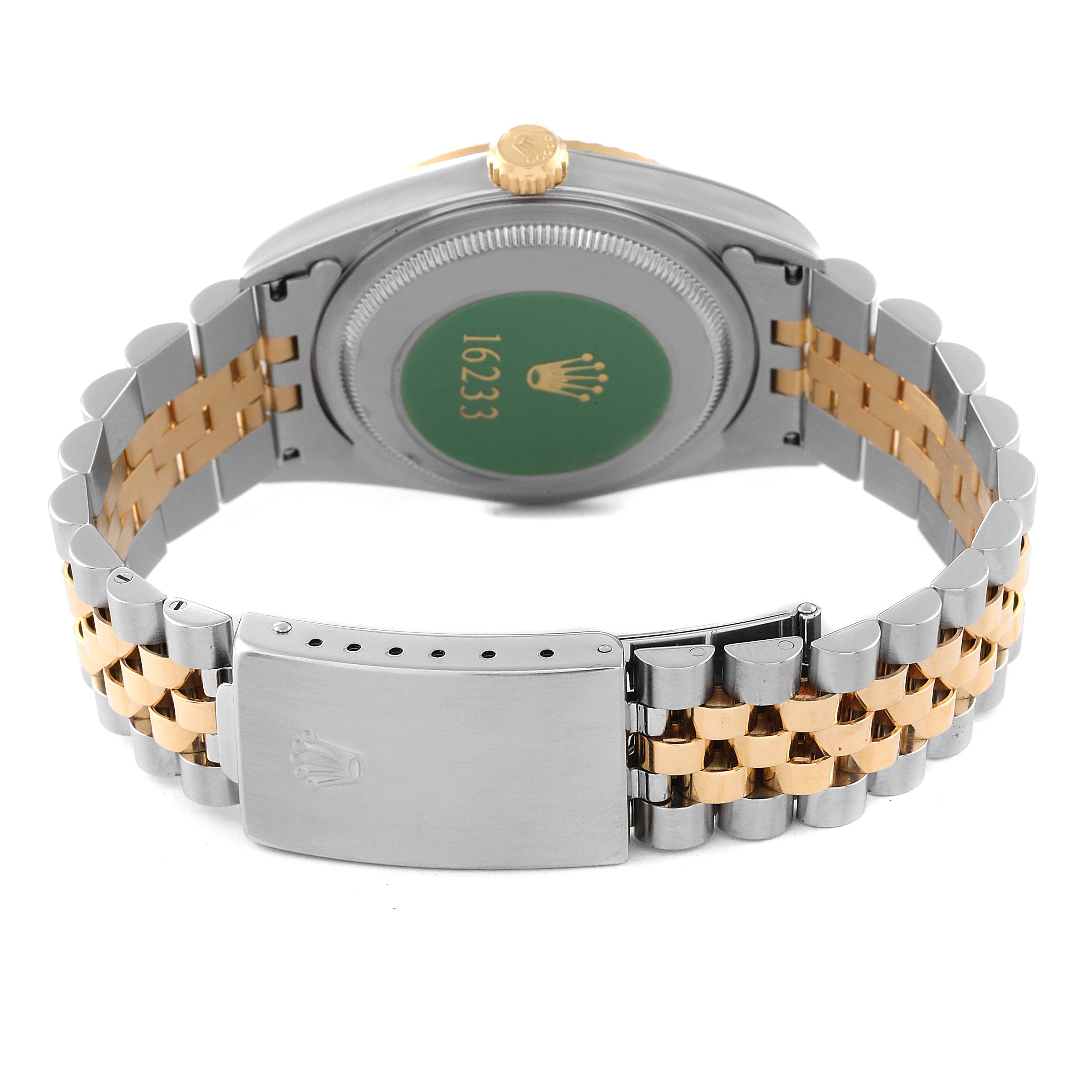 This image shows the back view of a Rolex Datejust 16233 Men's Steel and Gold (two tone) Silver Dial 16233 Men's Steel and Gold (two tone) Silver Dial watch, highlighting its two-tone bracelet and clasp.
