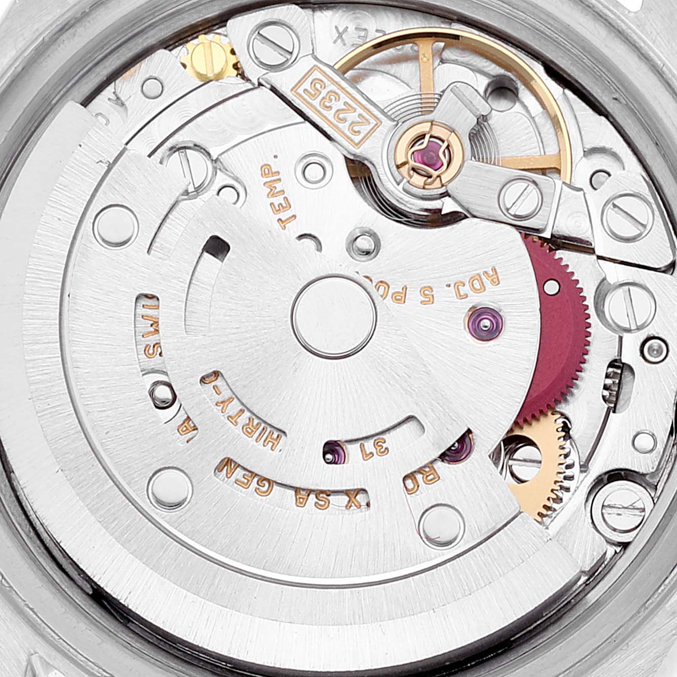 This is a close-up view of the Rolex Datejust 79163 Women's Steel and Gold (two tone) Beige Dial 79163 Women's Steel and Gold (two tone) Beige Dial watch movement, showing the intricate internal mechanics.