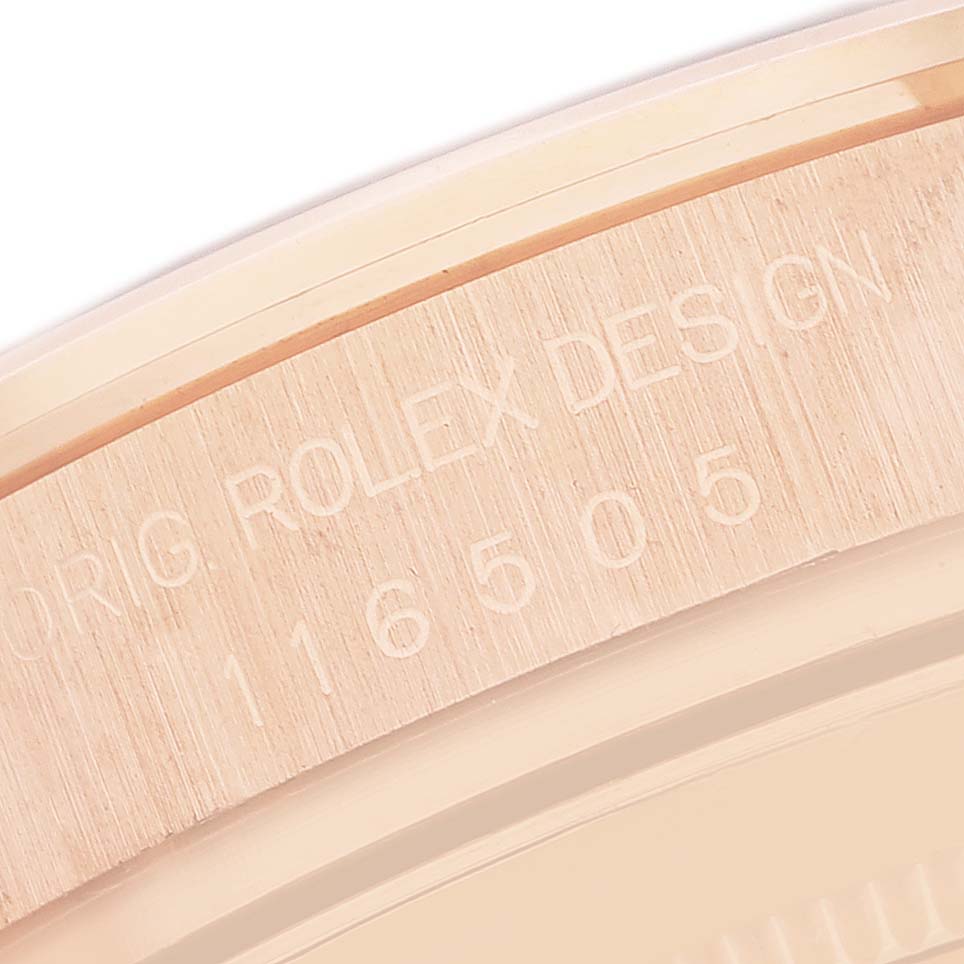 This image shows a close-up of the side engraving on the Rolex Daytona 116505 Men's Rose Gold Pink Dial model, featuring the model number and branding details.