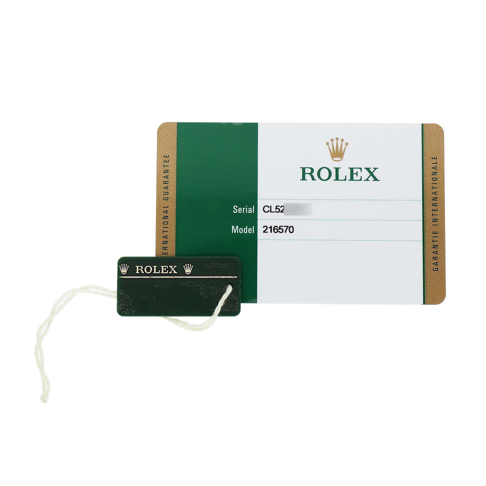 The image shows a Rolex Explorer 216570 Men's Stainless Steel Black Dial model guarantee card and a green Rolex tag with a string.