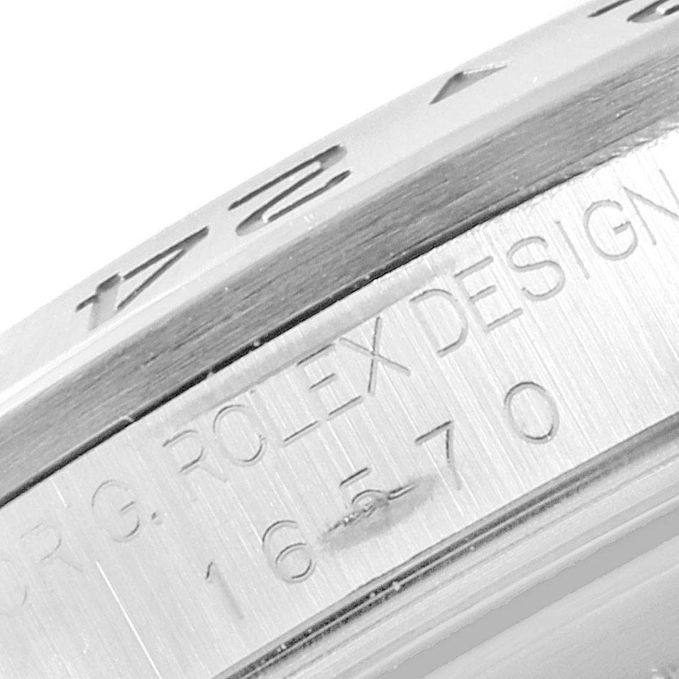 The image shows a close-up angle revealing the engraved bezel and serial number on the side of the Rolex Explorer 16570 Men
s Stainless Steel White Dial 16570 Men
s Stainless Steel White Dial watch.