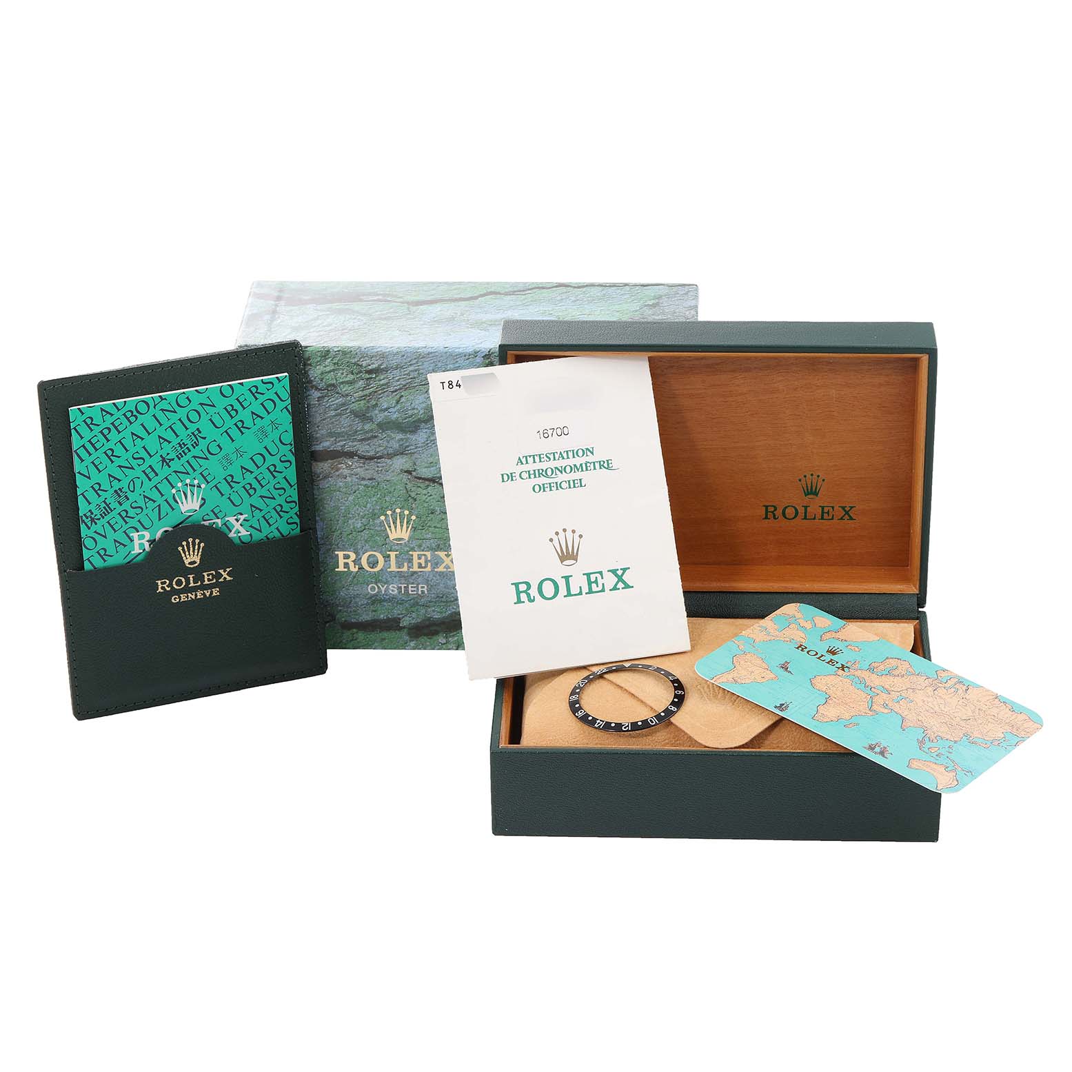 The image shows a Rolex GMT-Master 16700 Men
s Stainless Steel Black Dial 16700 Men
s Stainless Steel Black Dial watch box, bezel, manual, Best Quality
ity card, and papers from a front angle.