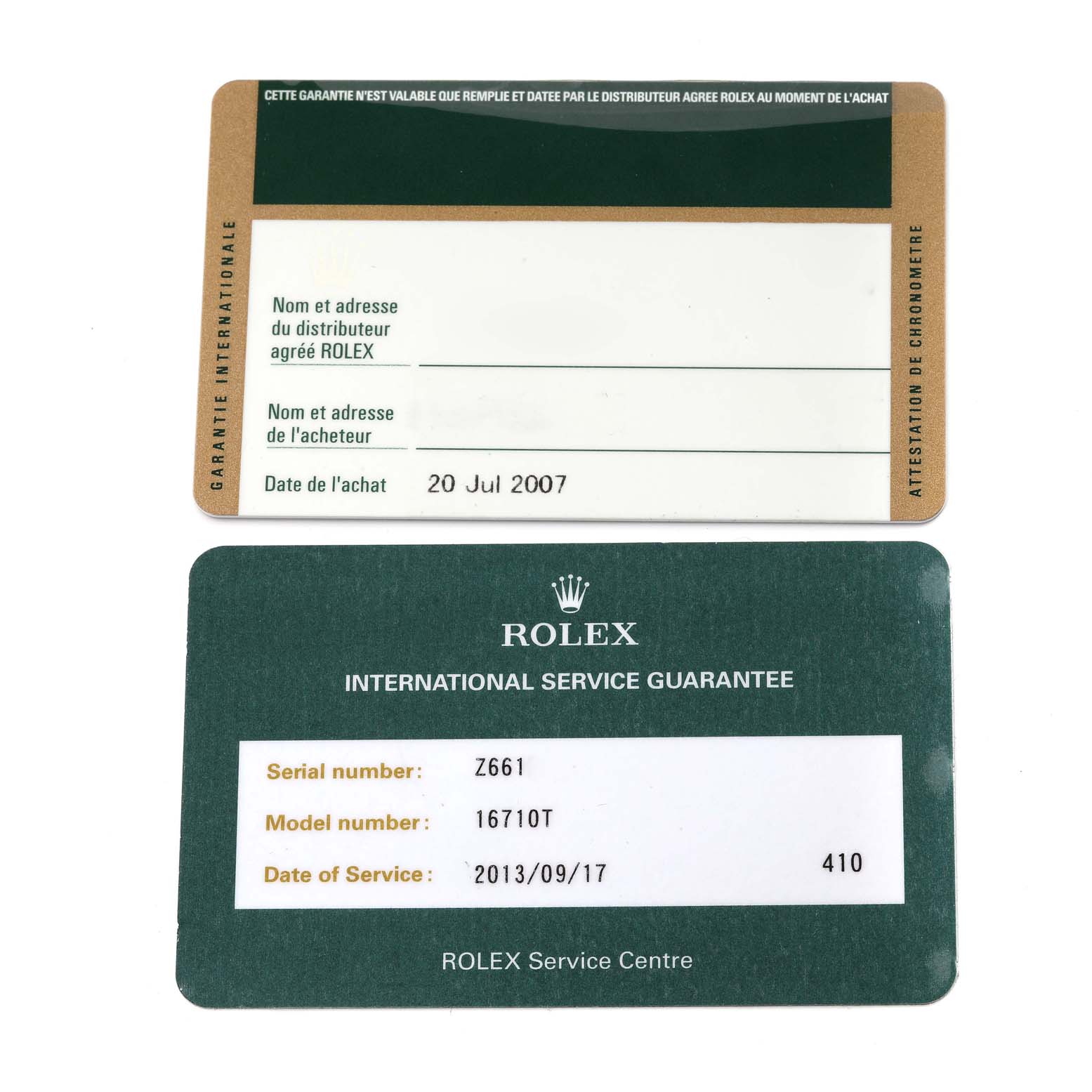 The image shows the warranty and service guarantee cards for a Rolex GMT-Master 16710 Men
s Stainless Steel Black Dial 16710 Men
s Stainless Steel Black Dial model watch.