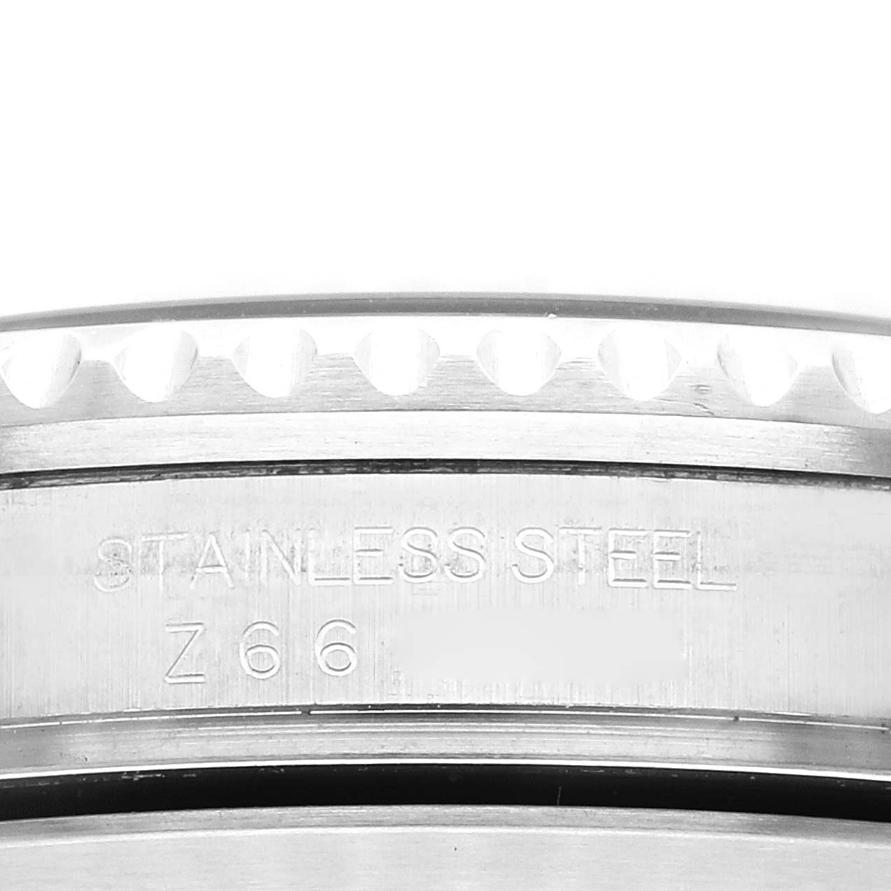 The image shows a close-up of the stainless steel back casing of a Rolex GMT-Master 16710 Men
s Stainless Steel Black Dial 16710 Men
s Stainless Steel Black Dial watch.