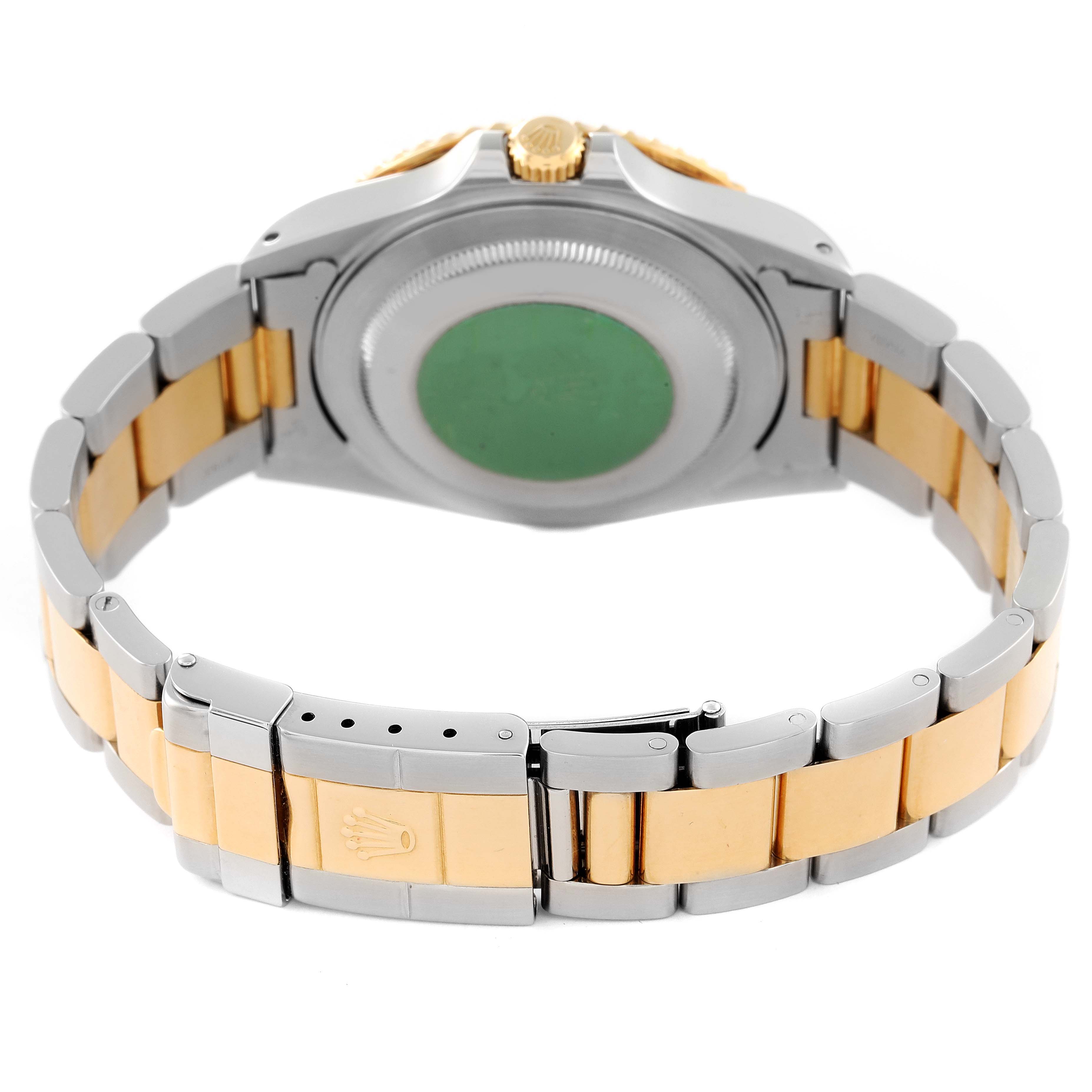 The image shows the back and bracelet clasp of a Rolex Submariner 16713 Men's Steel and Gold (two tone) Champagne Dial 16713 Men's Steel and Gold (two tone) Champagne Dial watch, highlighting its two-tone design.