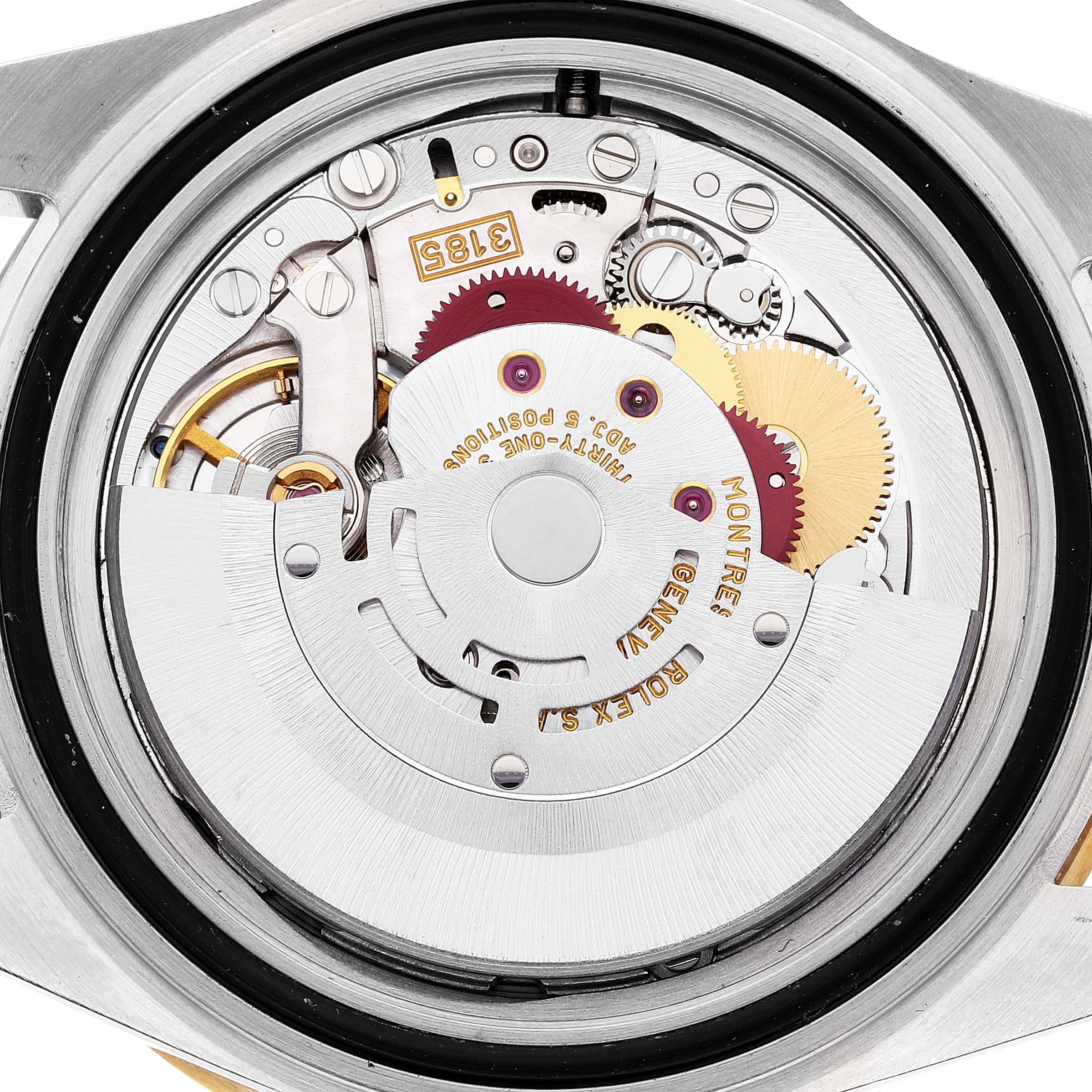 This image shows the internal movement mechanism of a Rolex Submariner 16713 Men's Steel and Gold (two tone) Champagne Dial 16713 Men's Steel and Gold (two tone) Champagne Dial watch from a back angle.