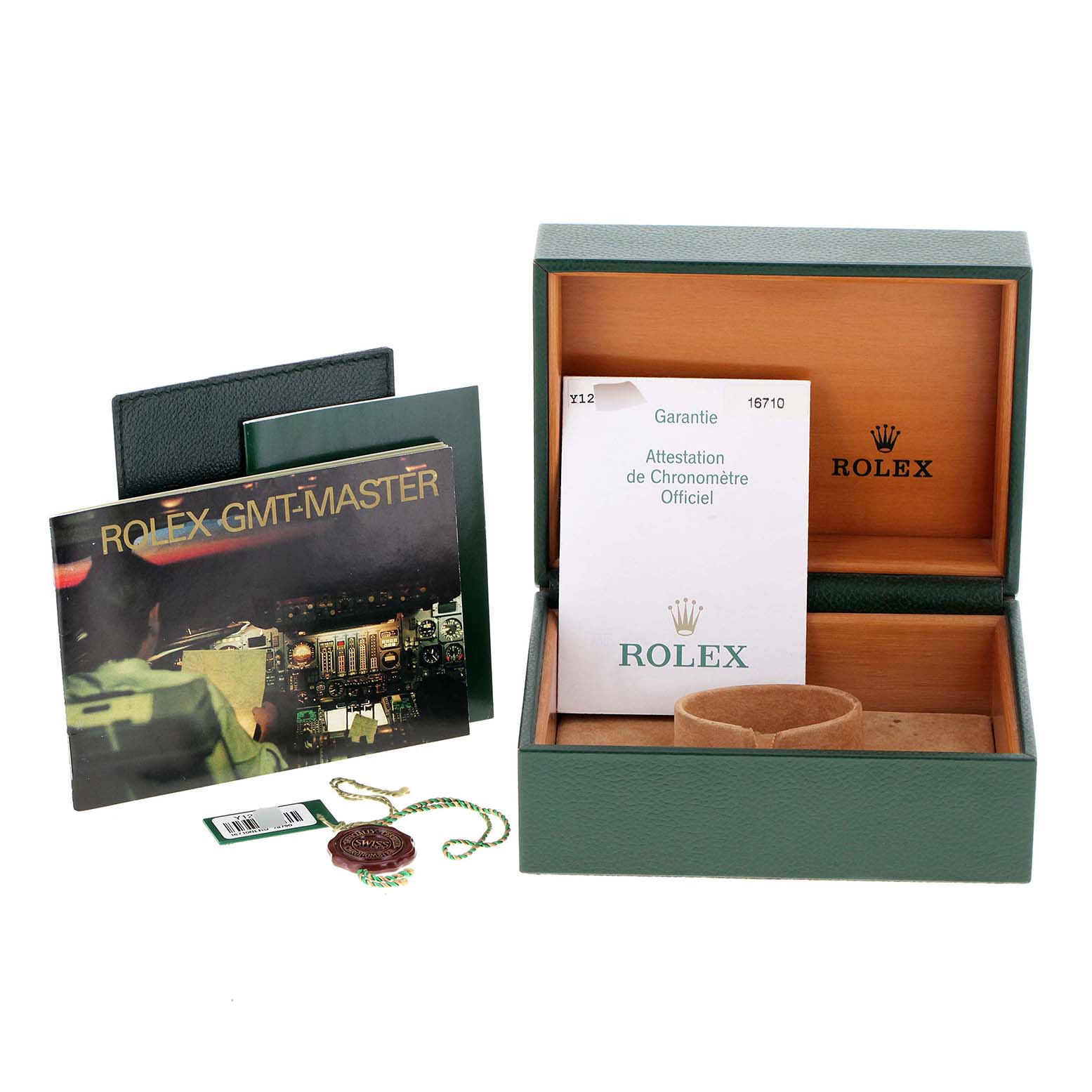 The image shows a Rolex GMT-Master 16710 Men
s Stainless Steel Black Dial 16710 Men
s Stainless Steel Black Dial watch box, manuals, warranty card, and tag, viewed from the front.