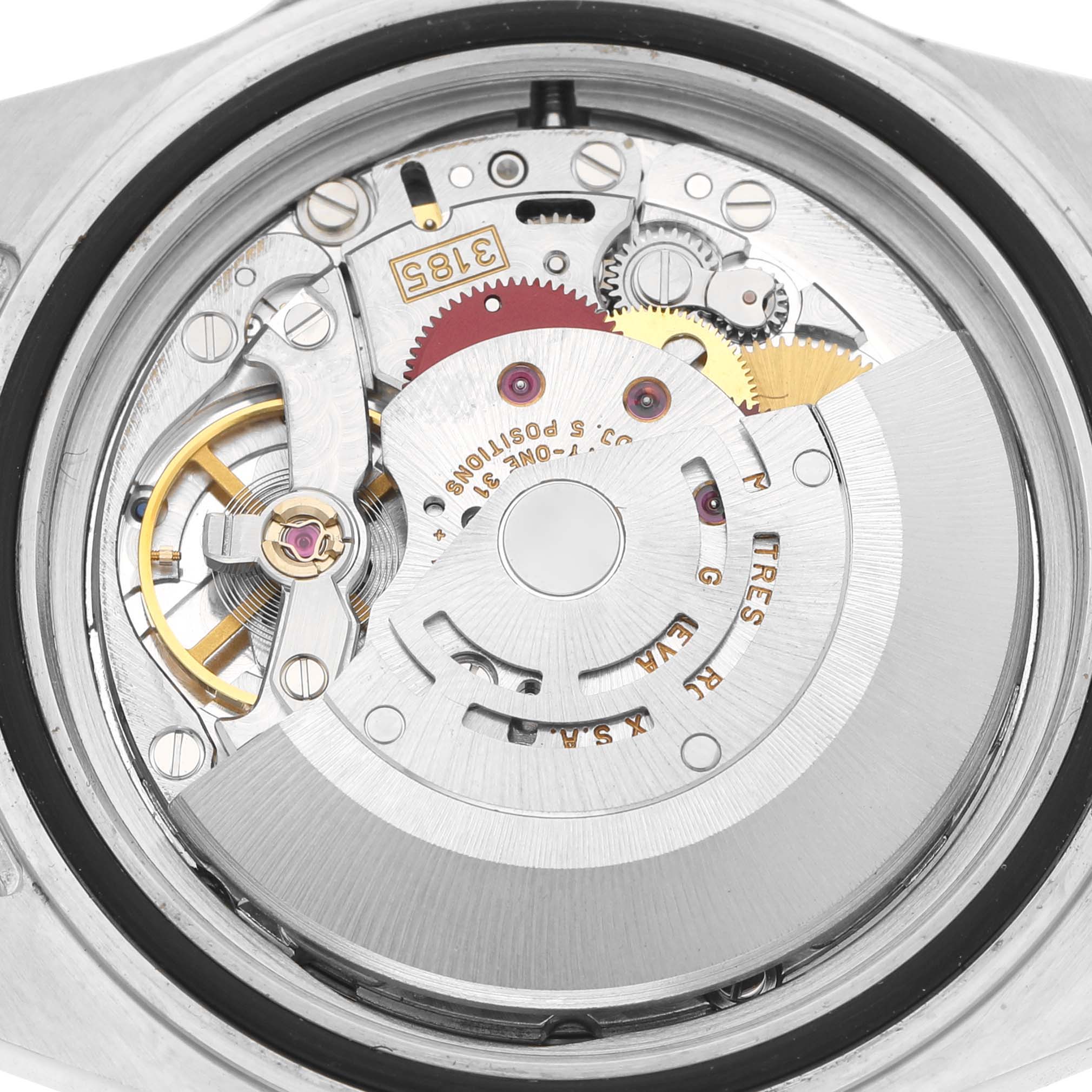 The image shows the movement and internal mechanics of the Rolex GMT-Master 16710 Men's Stainless Steel Black Dial watch from a top-down angle.