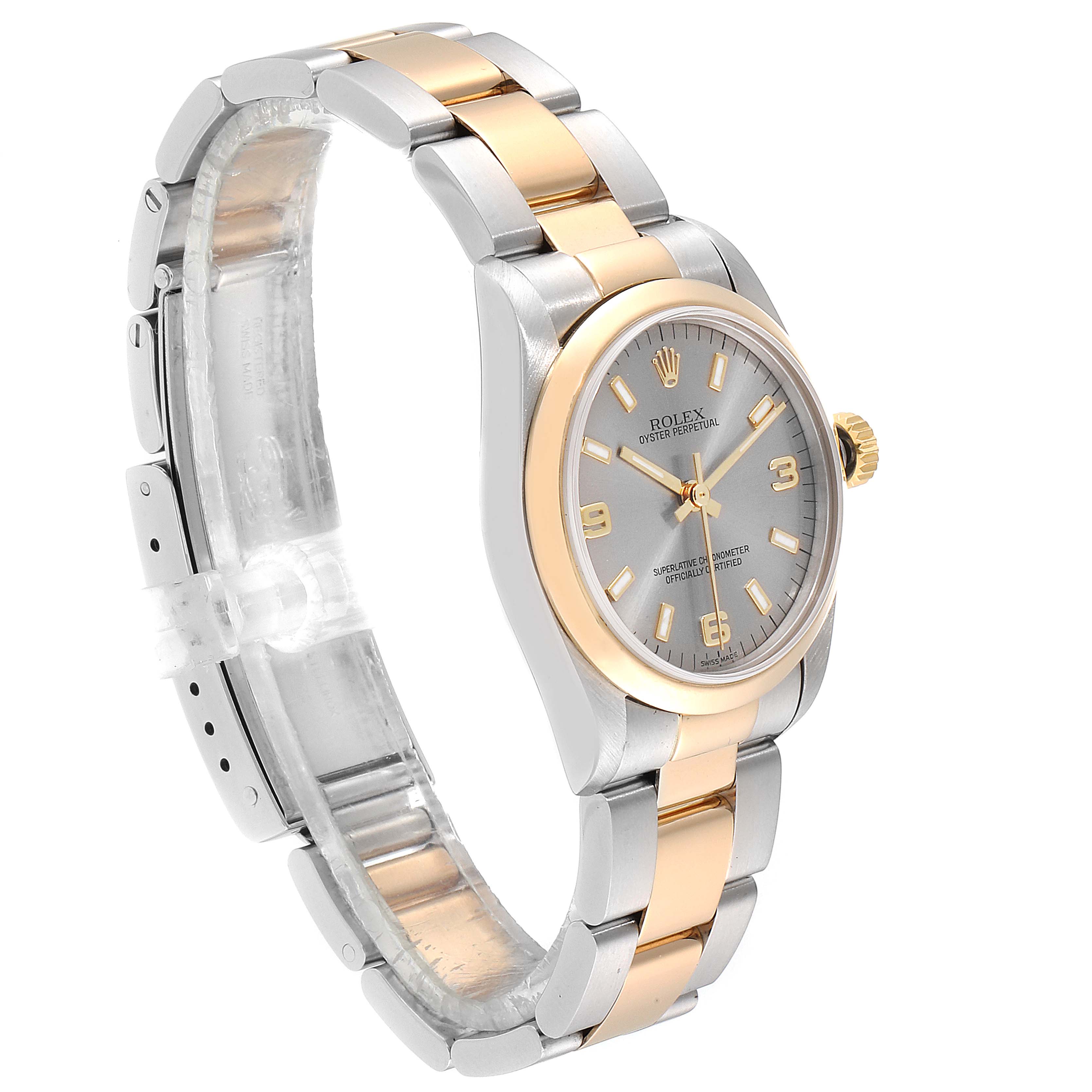 The Rolex Mid-Size 77483 Women
s Steel and Gold (two tone) Grey Dial 77483 Women
s Steel and Gold (two tone) Grey Dial model watch is shown from a front-side angle, displaying its two-tone bracelet, case, dial, and crown.