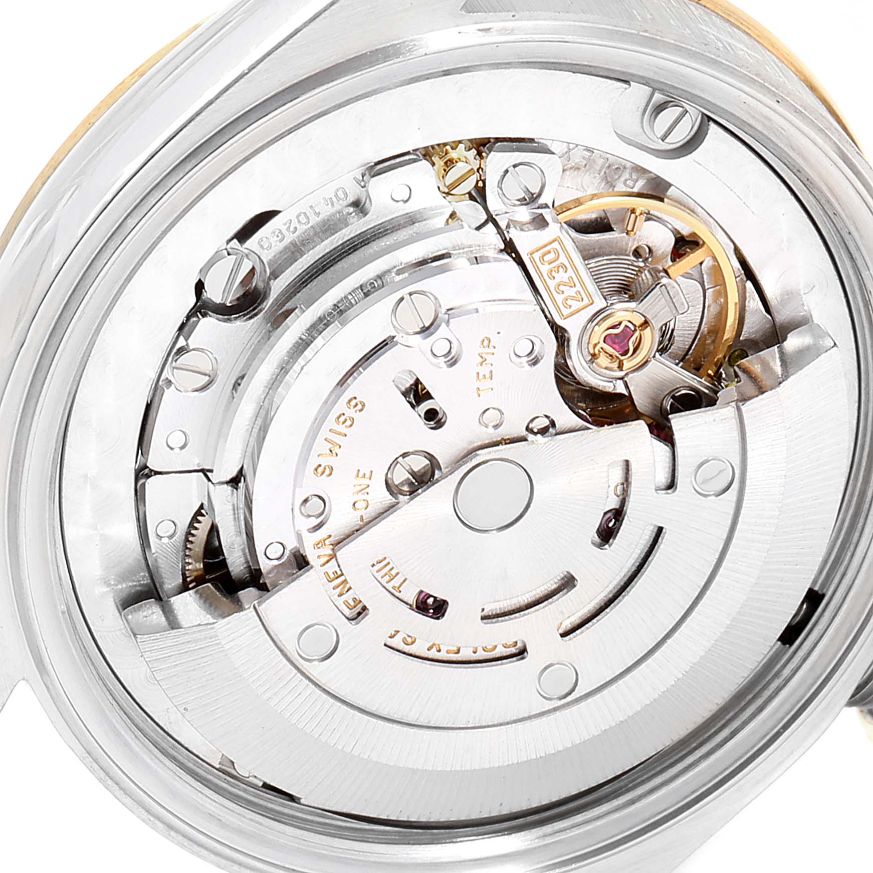The image shows a close-up view of the internal mechanism of the Mid-Size Rolex watch.
