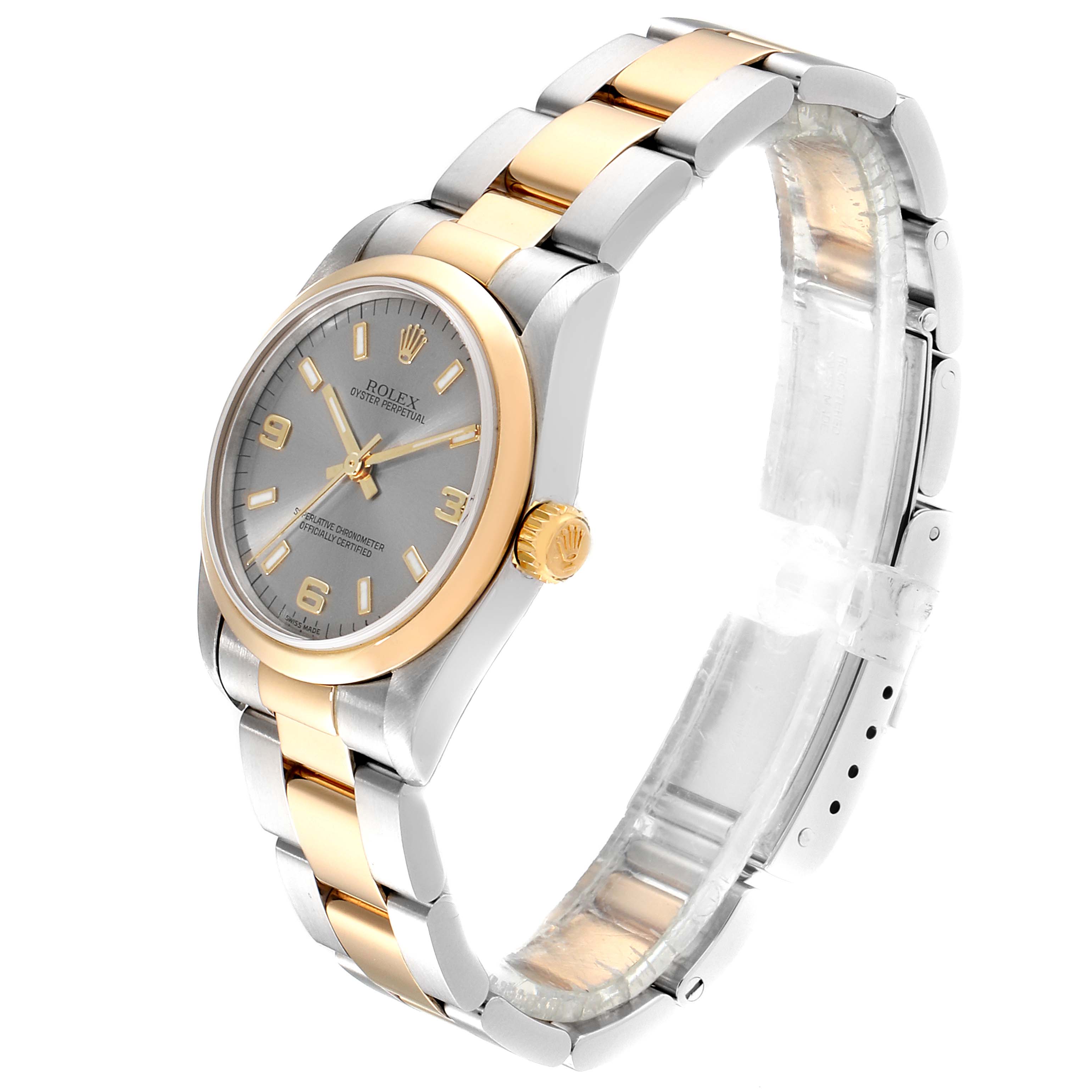 The image shows a Rolex Mid-Size 77483 Women
s Steel and Gold (two tone) Grey Dial 77483 Women
s Steel and Gold (two tone) Grey Dial model watch at a front-left angle, featuring its two-tone bracelet, dial, and crown.