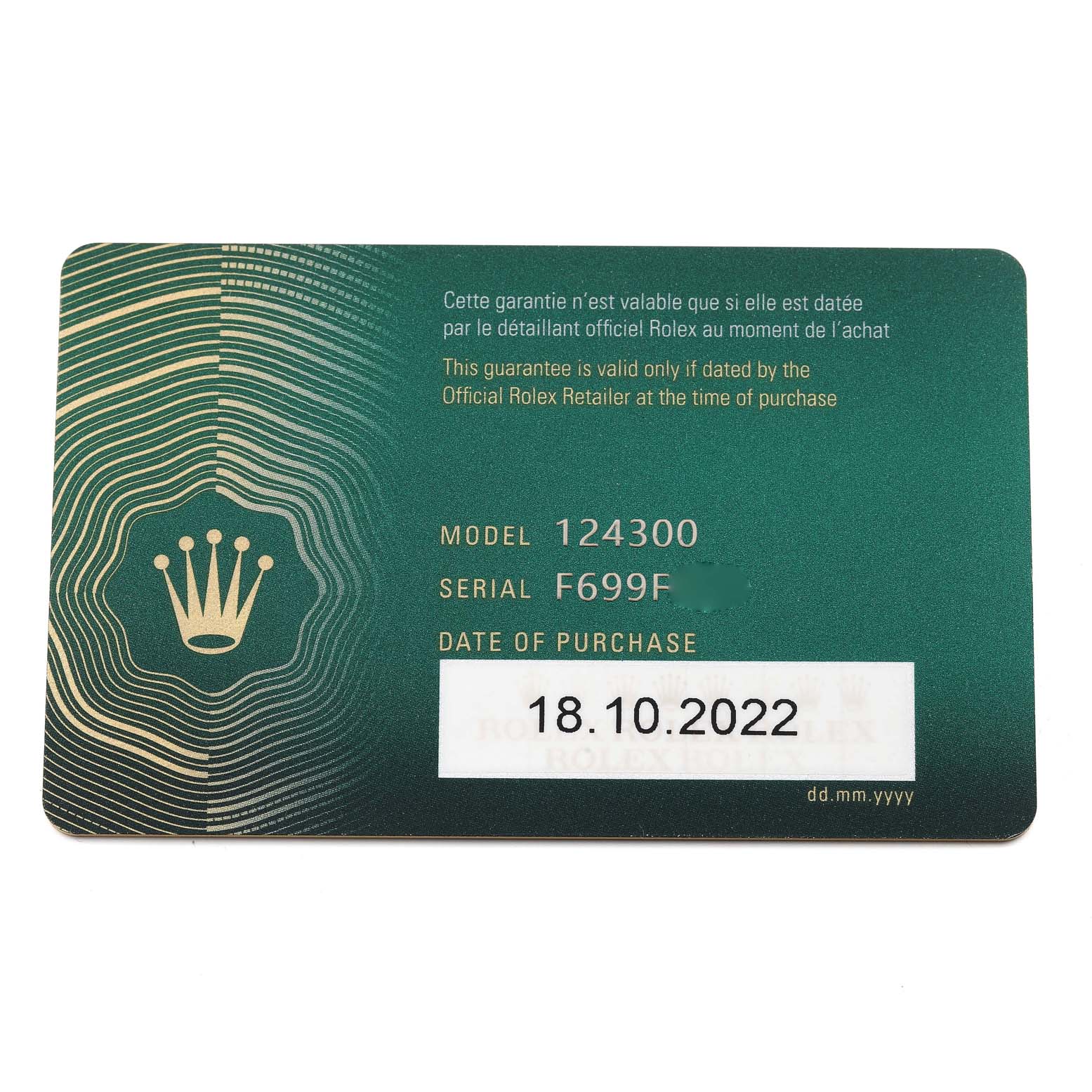 The image shows the warranty card for the Rolex Oyster Perpetual 124300 Men
s Stainless Steel Blue Dial 124300 Men
s Stainless Steel Blue Dial model 124300, including the model and serial numbers, and the date of purchase.
