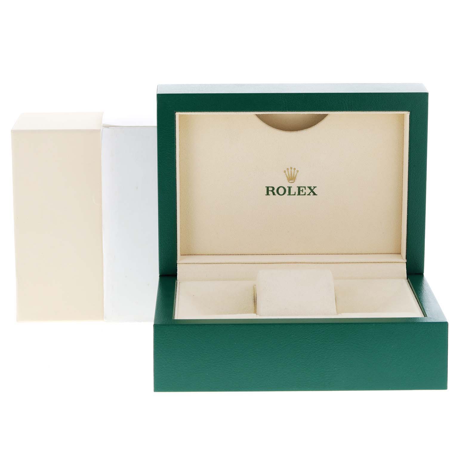 The image shows an open green and beige box for a Rolex Oyster Perpetual 116000 Men's Stainless Steel Silver Dial 116000 Men's Stainless Steel Silver Dial watch, with the brand logo inside.