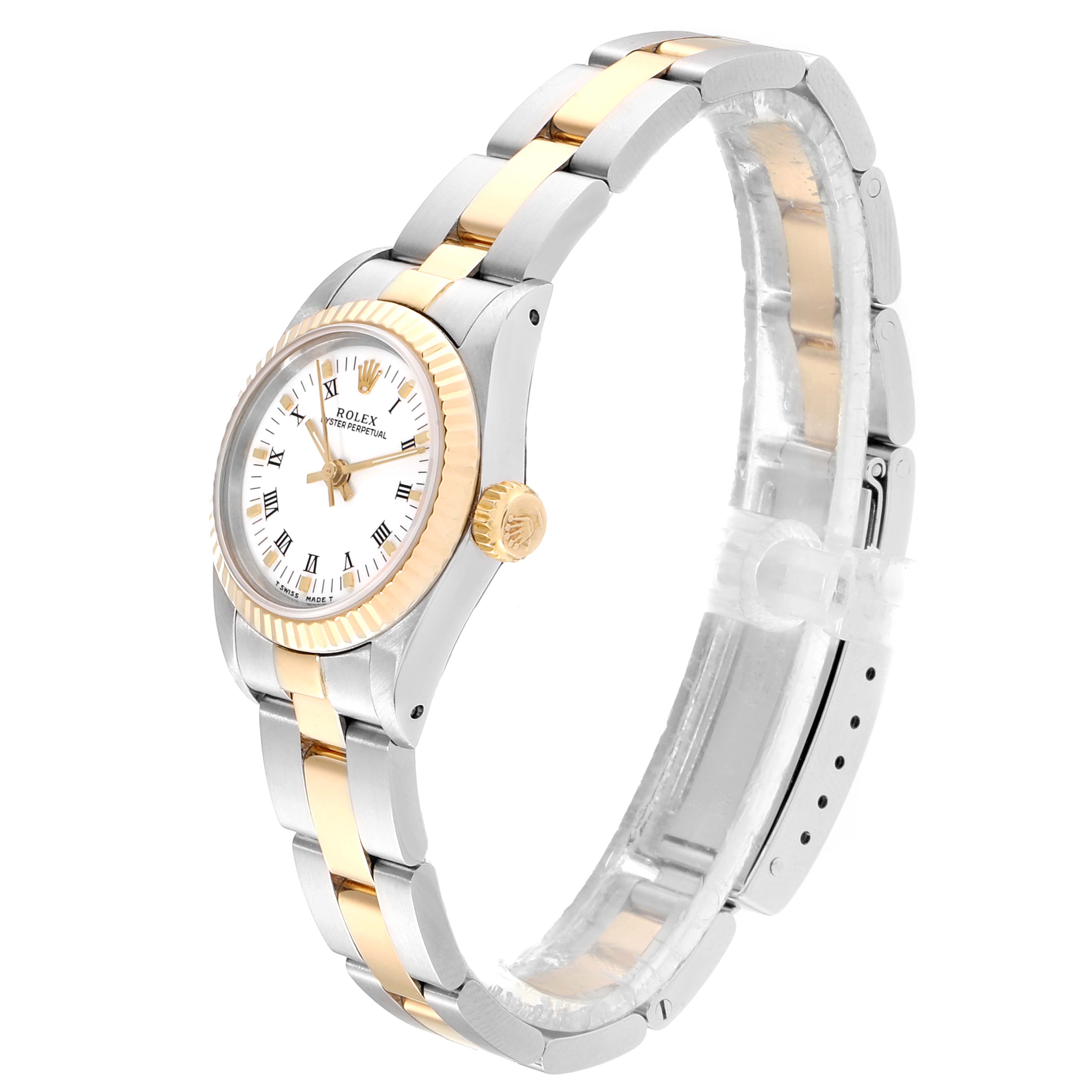 The image shows a side and slight top view of a Rolex Oyster Perpetual 67193 Women
s Steel and Gold (two tone) White Dial 67193 Women
s Steel and Gold (two tone) White Dial watch, highlighting the case, bezel, dial, crown, and bracelet.