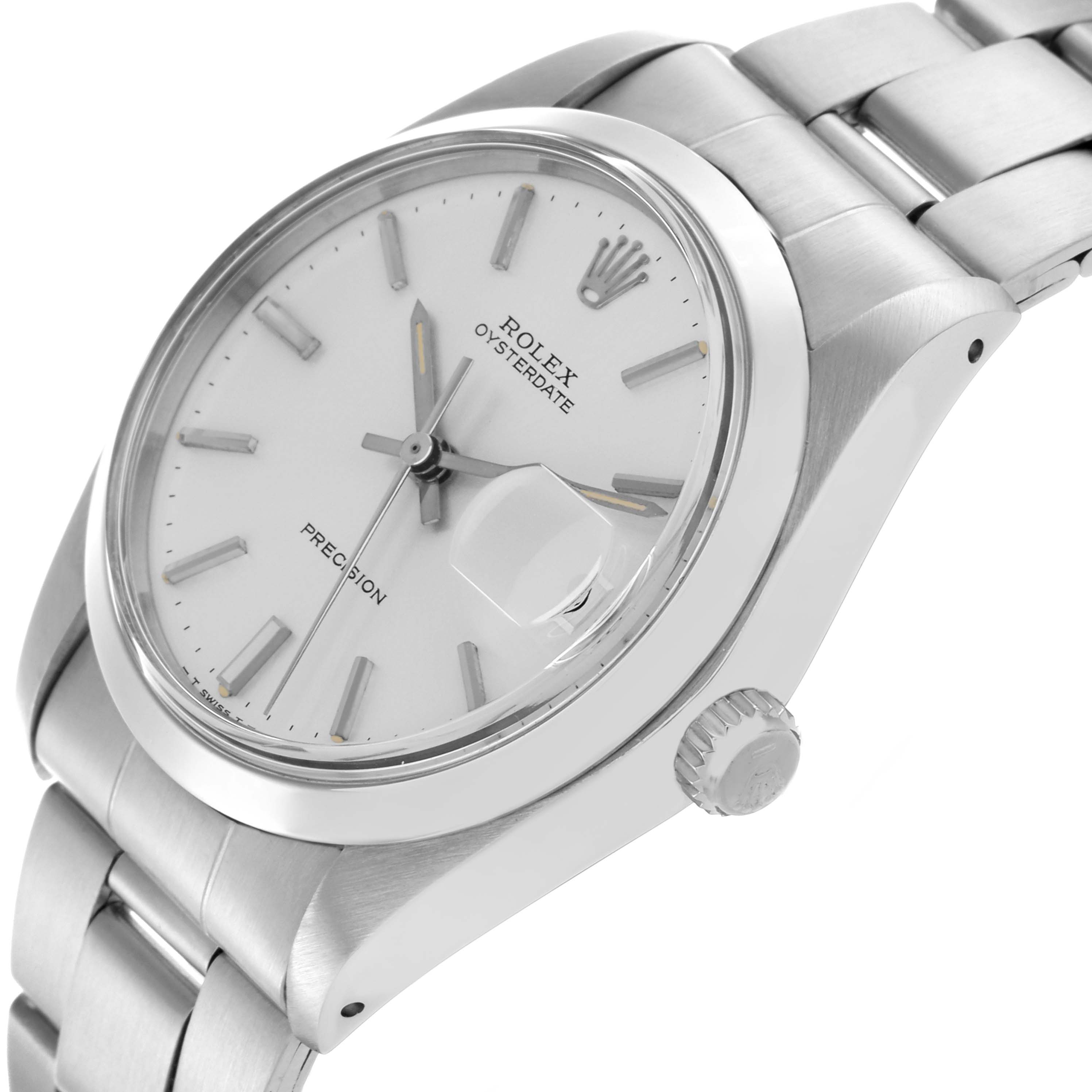 The Rolex Date 6694 Men's Stainless Steel Silver Dial 6694 Men's Stainless Steel Silver Dial watch is shown at an angled side view, highlighting the dial, bezel, crown, and the jubilee bracelet.
