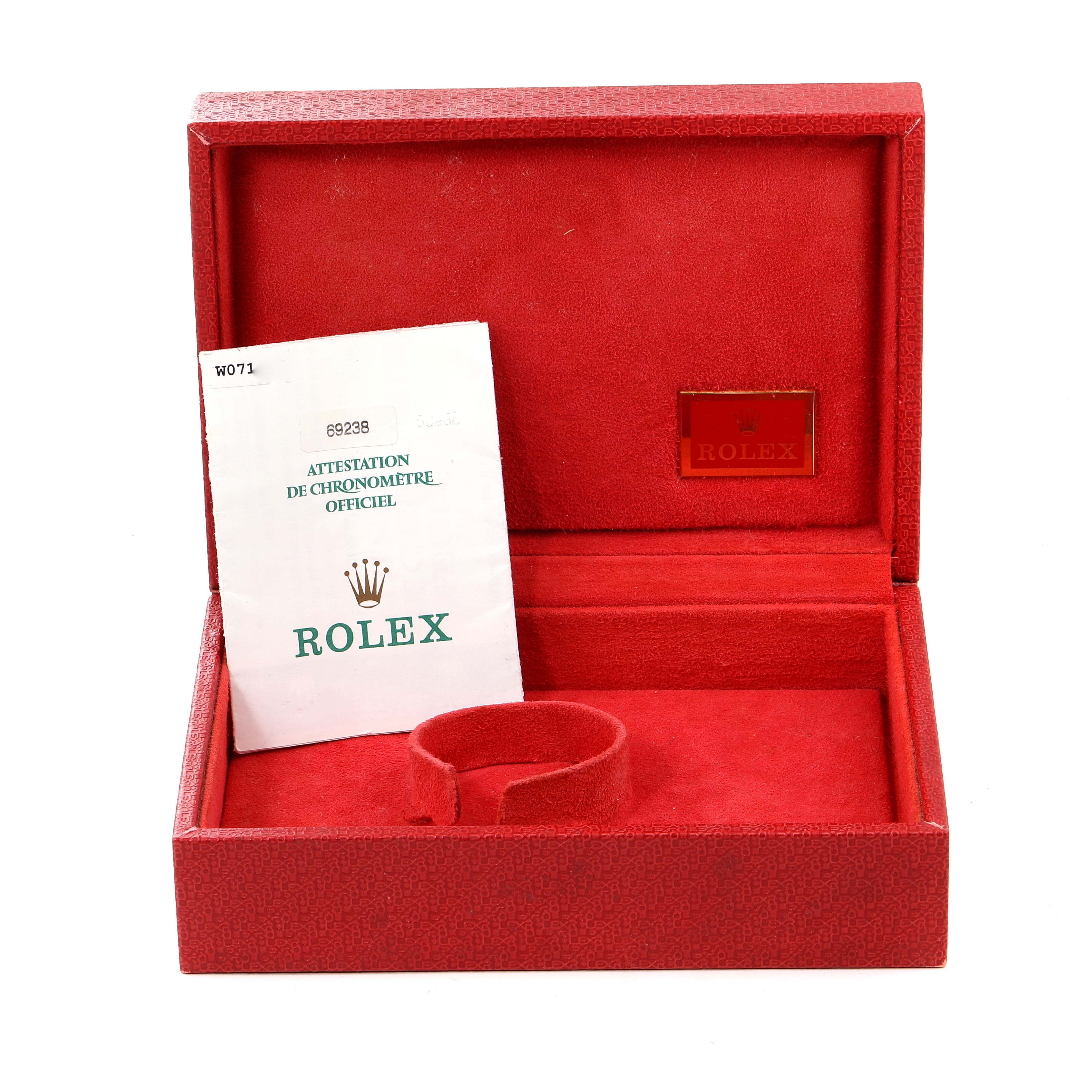 The image shows an open red Rolex President 69238 Women
s Yellow Gold Mother of Pearl Dial 69238 Women
s Yellow Gold Mother of Pearl Dial model watch box with a certificate booklet inside.