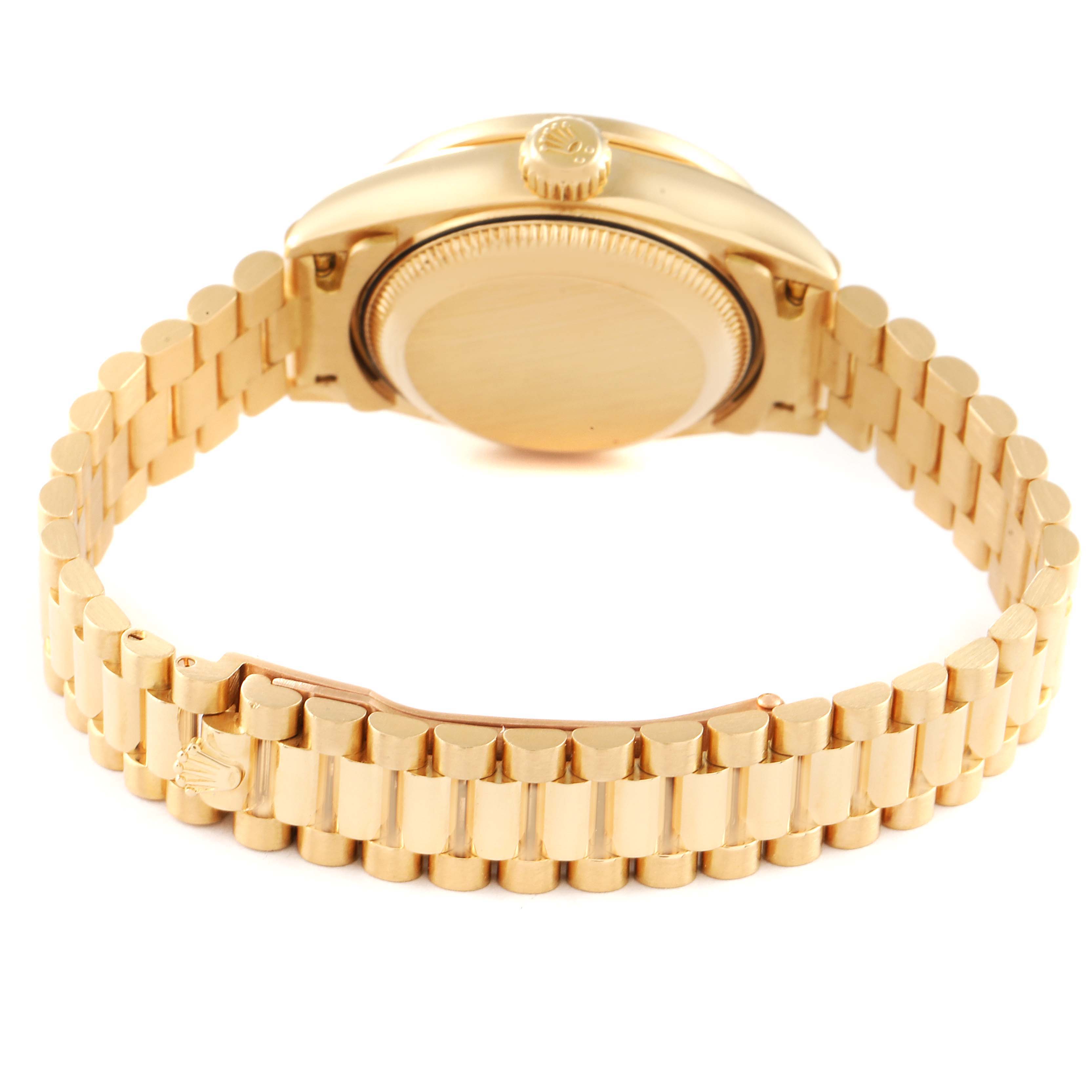 The image shows the back view of a Rolex President 69238 Women
s Yellow Gold Mother of Pearl Dial 69238 Women
s Yellow Gold Mother of Pearl Dial watch, highlighting the case back, crown, and bracelet.