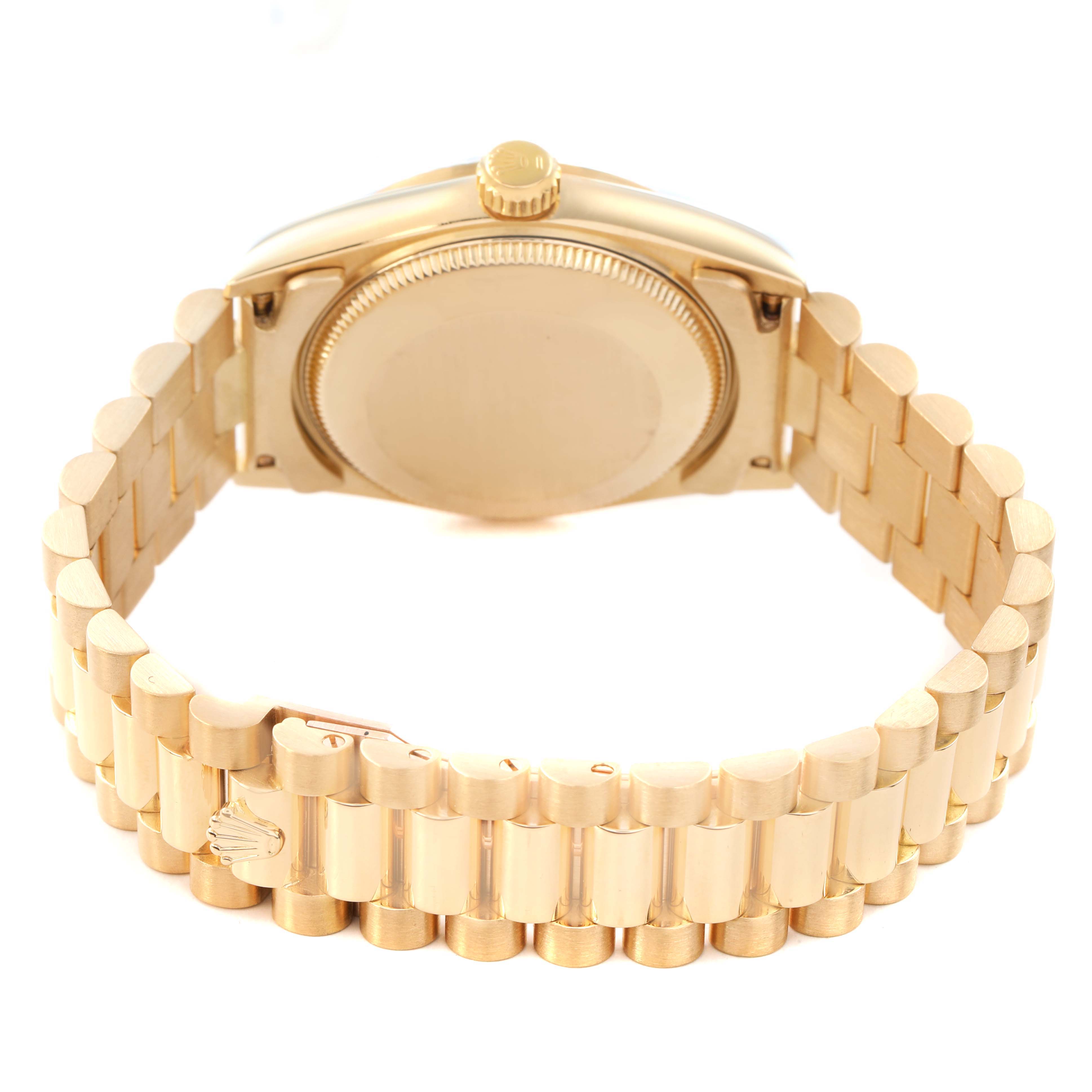 The image shows the back view of a Rolex Datejust 68278 Women's Yellow Gold White Dial, highlighting the bracelet, case back, and crown.