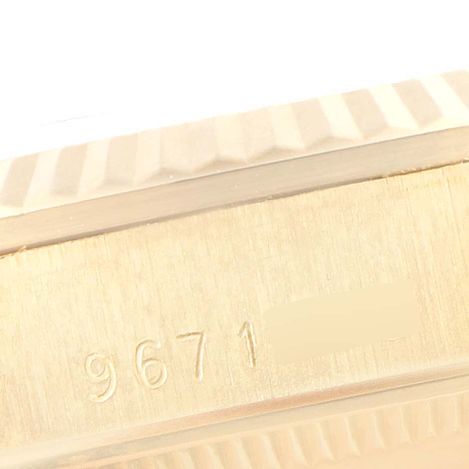 The image shows a close-up angle detailing the serial number engraving on the side case of a Rolex President 68278 Women
s Yellow Gold Champagne Dial 68278 Women
s Yellow Gold Champagne Dial model watch.