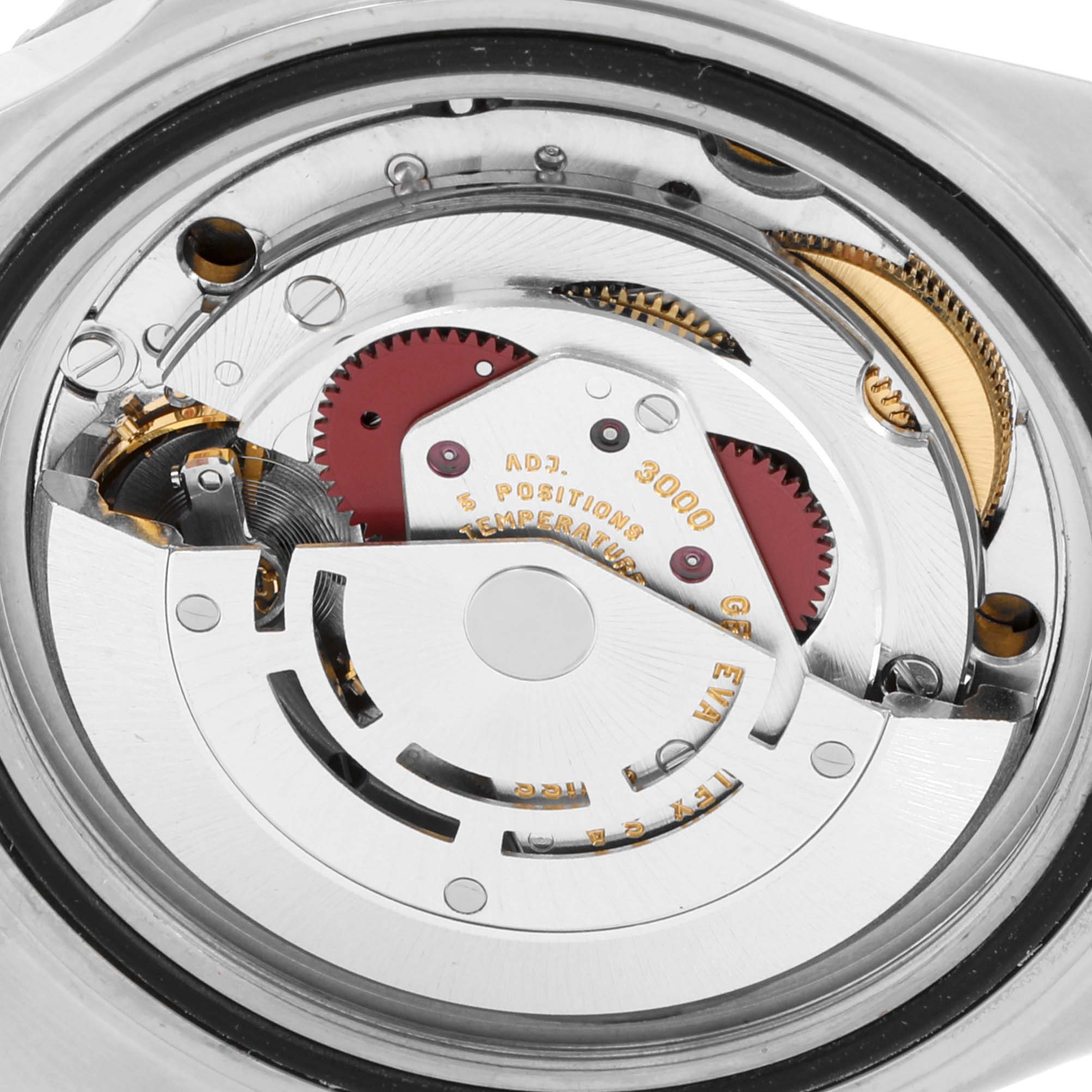 This image shows the inner movement mechanism of a Rolex Submariner 14060 Men's Stainless Steel Black Dial 14060 Men's Stainless Steel Black Dial watch from a top-down angle.