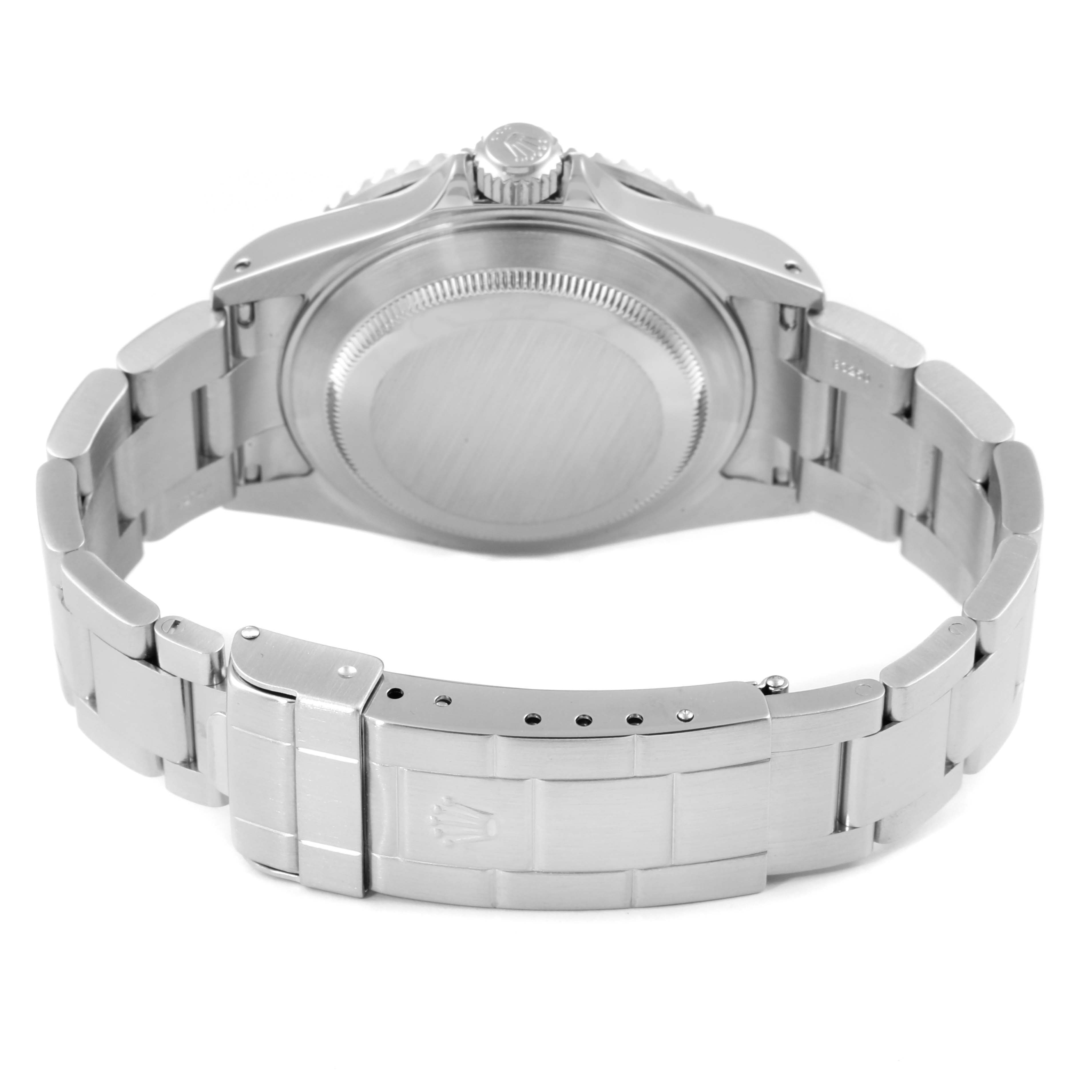 The image shows the back view of a Rolex Submariner 16610 Men
s Stainless Steel Black Dial 16610 Men
s Stainless Steel Black Dial watch, highlighting the case back and bracelet.