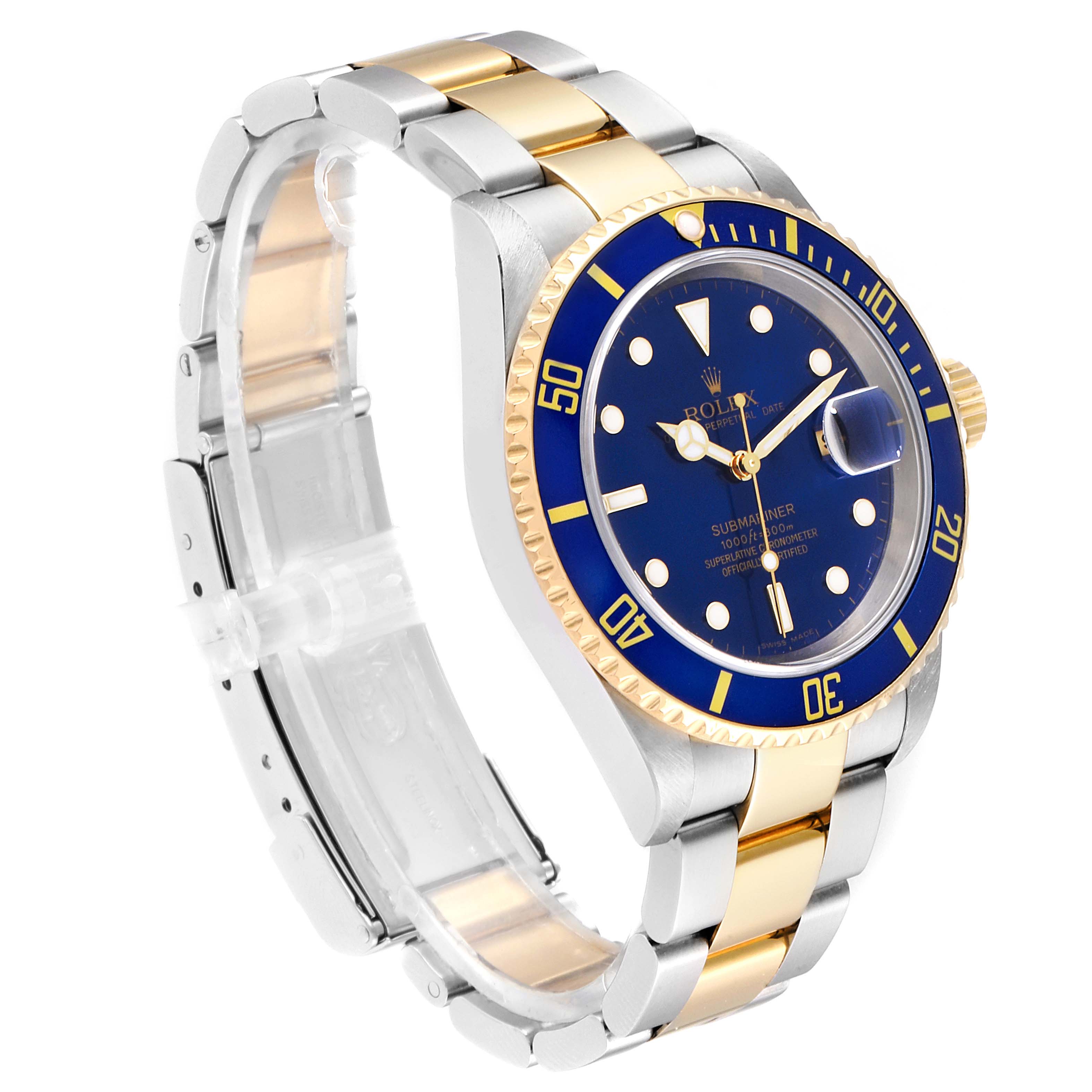 This image shows a Rolex Submariner 16613 Men
s Steel and Gold (two tone) Blue Dial 16613 Men
s Steel and Gold (two tone) Blue Dial watch at a 3/4 angle displaying its blue bezel, blue dial, and silver and gold bracelet.
