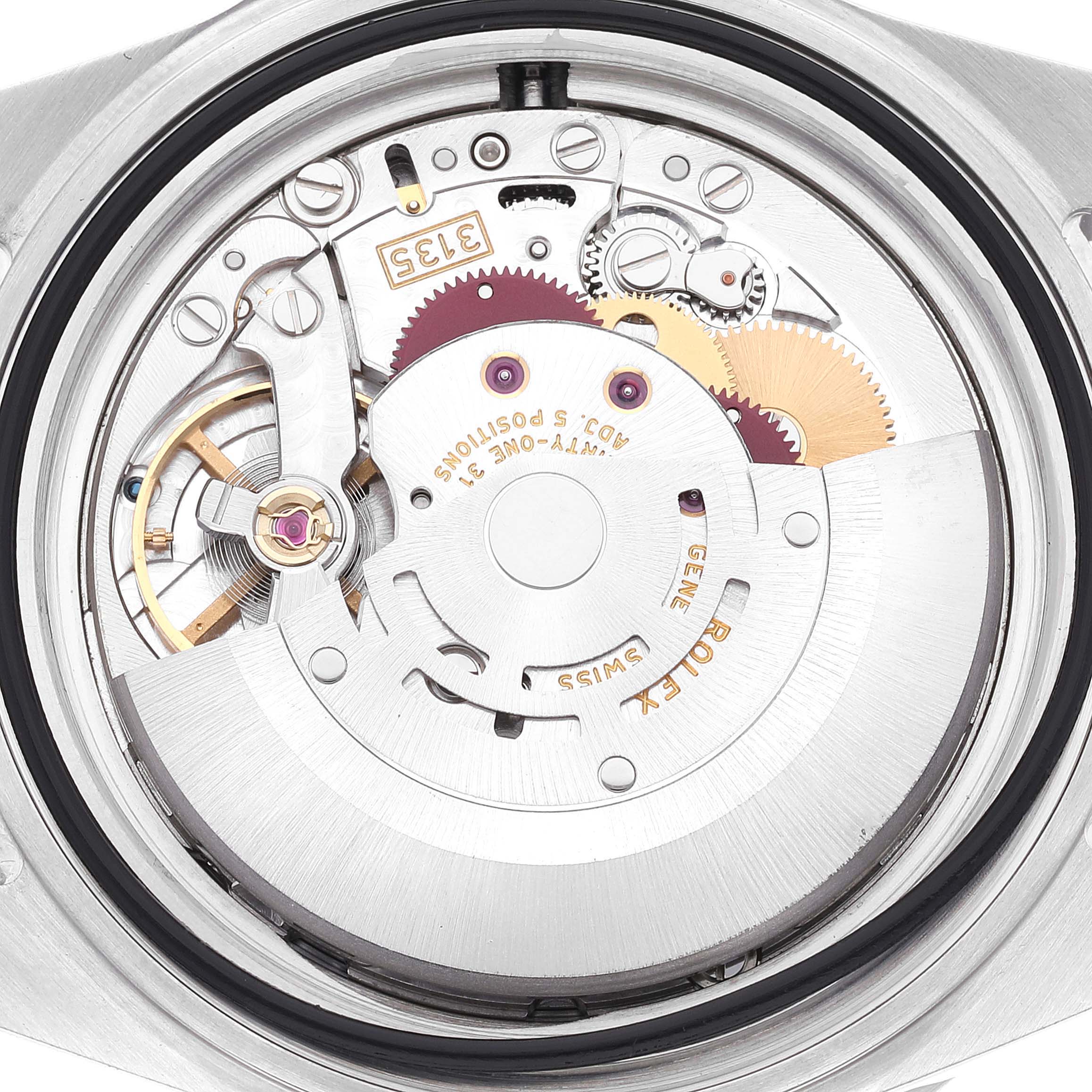 The image shows the internal mechanism and movement of a Rolex Submariner 16610 Men
s Stainless Steel Black Dial 16610 Men
s Stainless Steel Black Dial watch from a rear view angle.