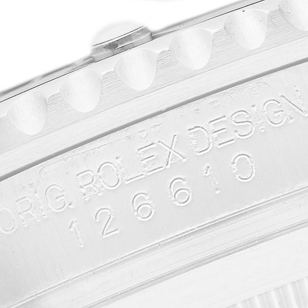 The image shows a close-up of the Rolex Submariner 126610LN Men's Stainless Steel Black Dial case side, featuring the model number and engraving.