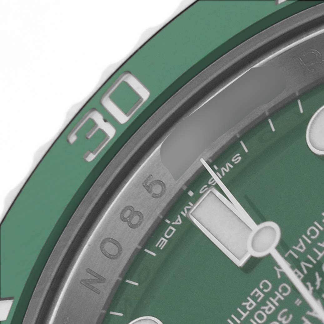 This close-up image shows the bezel, dial, and minute hand of a Rolex Submariner 116610LV Men's Stainless Steel Green Dial, highlighting the "30" marker.