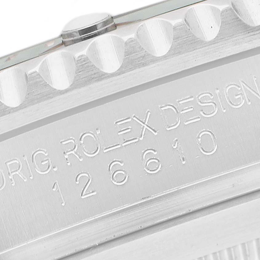 The image shows a close-up of the side of a Rolex Submariner 126610LV Men's Stainless Steel Black Dial, focusing on the engraved model number and bezel edge.