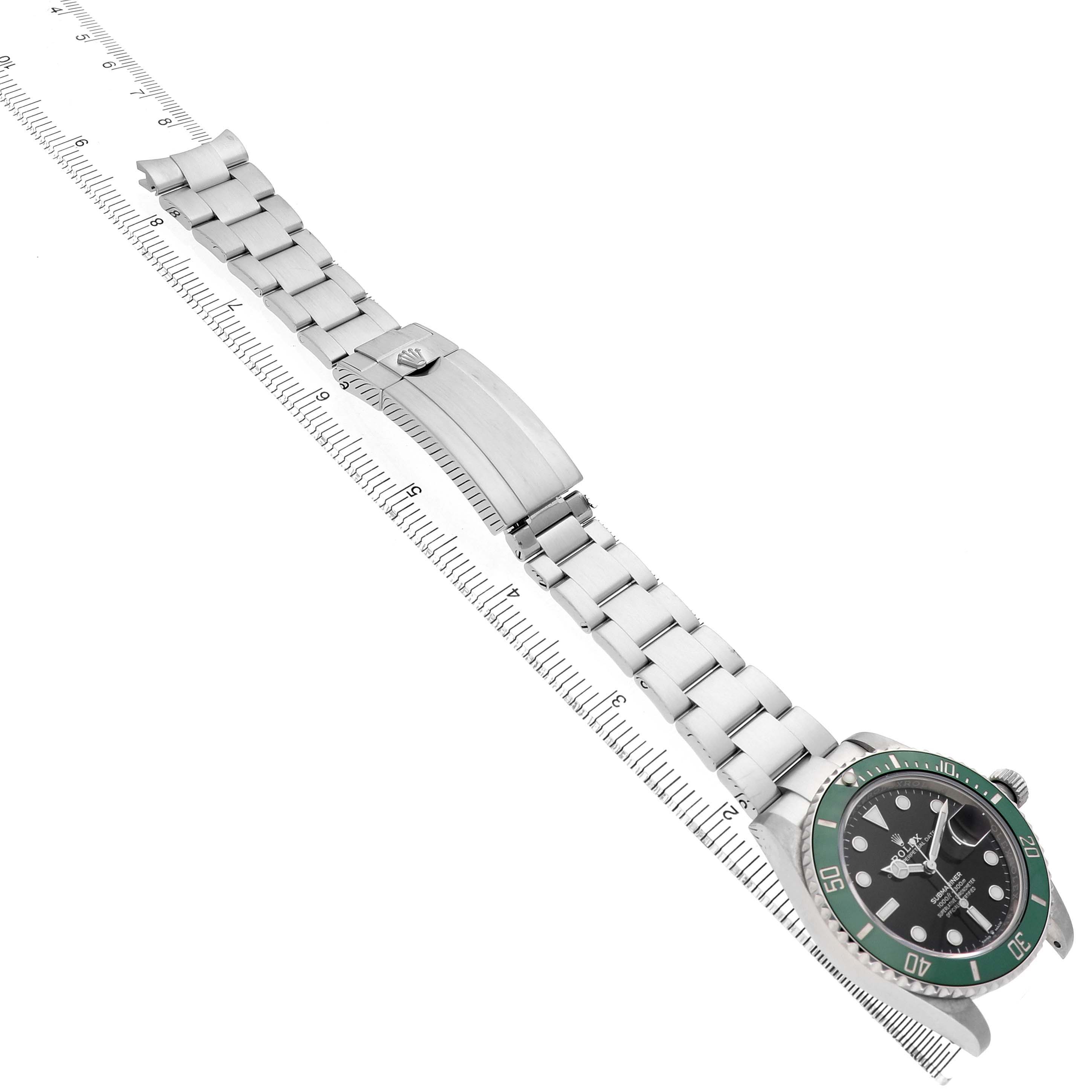 The Rolex Submariner 126610LV Men's Stainless Steel Black Dial watch is shown at a tilted angle, featuring the strap, clasp, and green bezel.