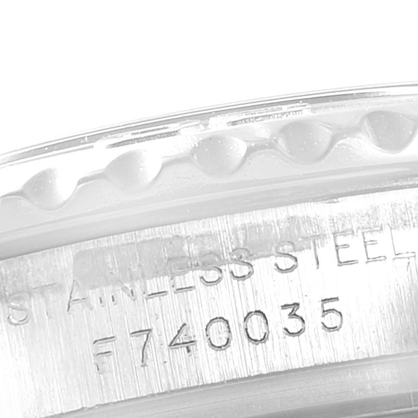 The image shows the serial number and part of the stainless steel bezel of a Rolex Yacht-Master 169622 Women's Stainless Steel Silver Dial 169622 Women's Stainless Steel Silver Dial watch.