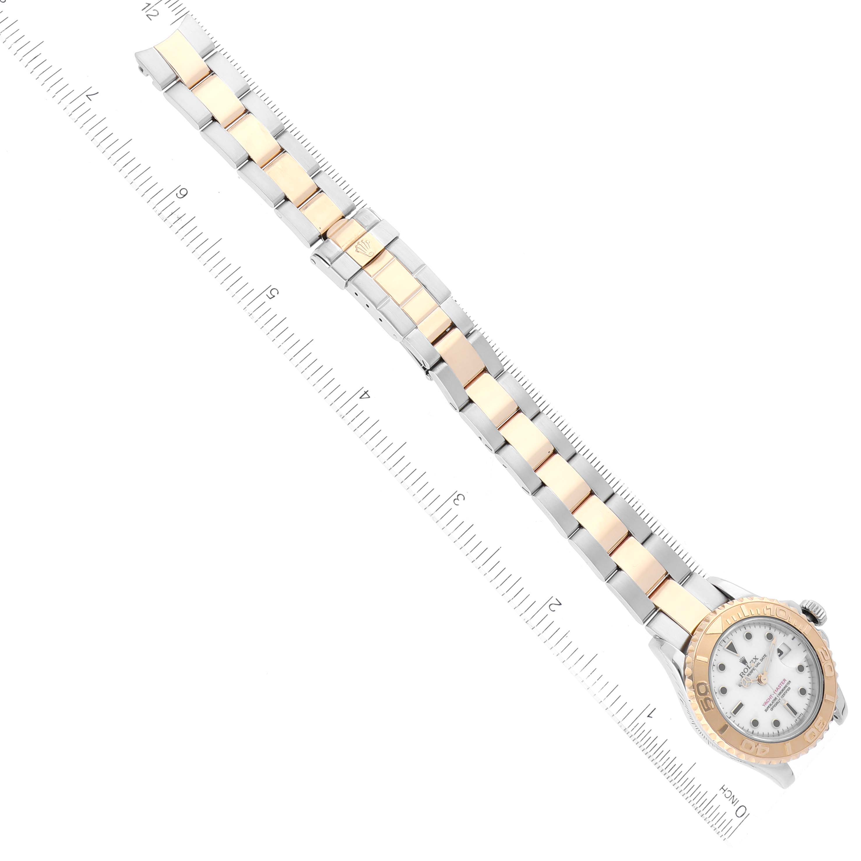 The image shows a top-down view of a Rolex Yacht-Master 69623 Women's Steel and Gold (two tone) White Dial 69623 Women's Steel and Gold (two tone) White Dial watch, displaying its full bracelet and bezel.