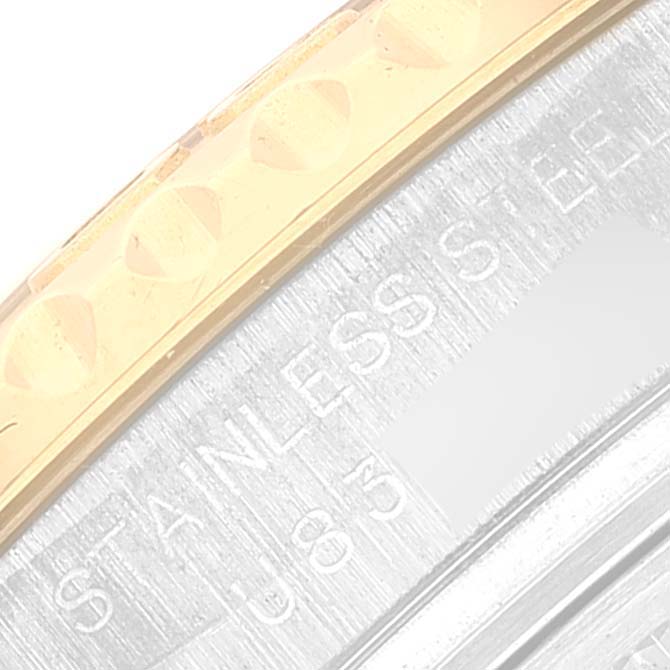 This image shows a close-up of the bezel and case side of the Rolex Yacht-Master 69623 Women's Steel and Gold (two tone) White Dial 69623 Women's Steel and Gold (two tone) White Dial watch.