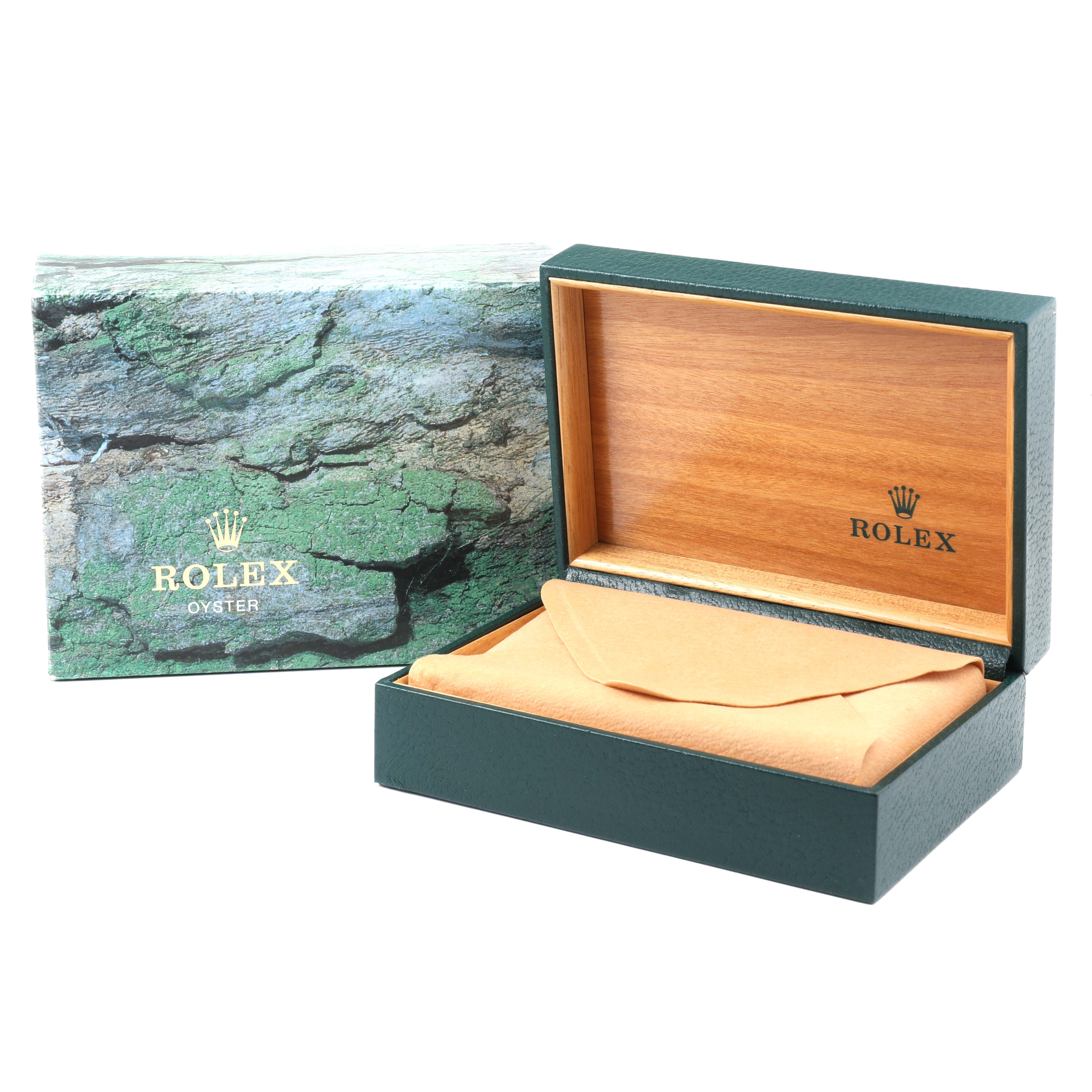The image shows a Rolex Yacht-Master 168622 Men's Stainless Steel Silver Dial watch box open, revealing the inner wooden lining and an outer sleeve with a green stone texture.