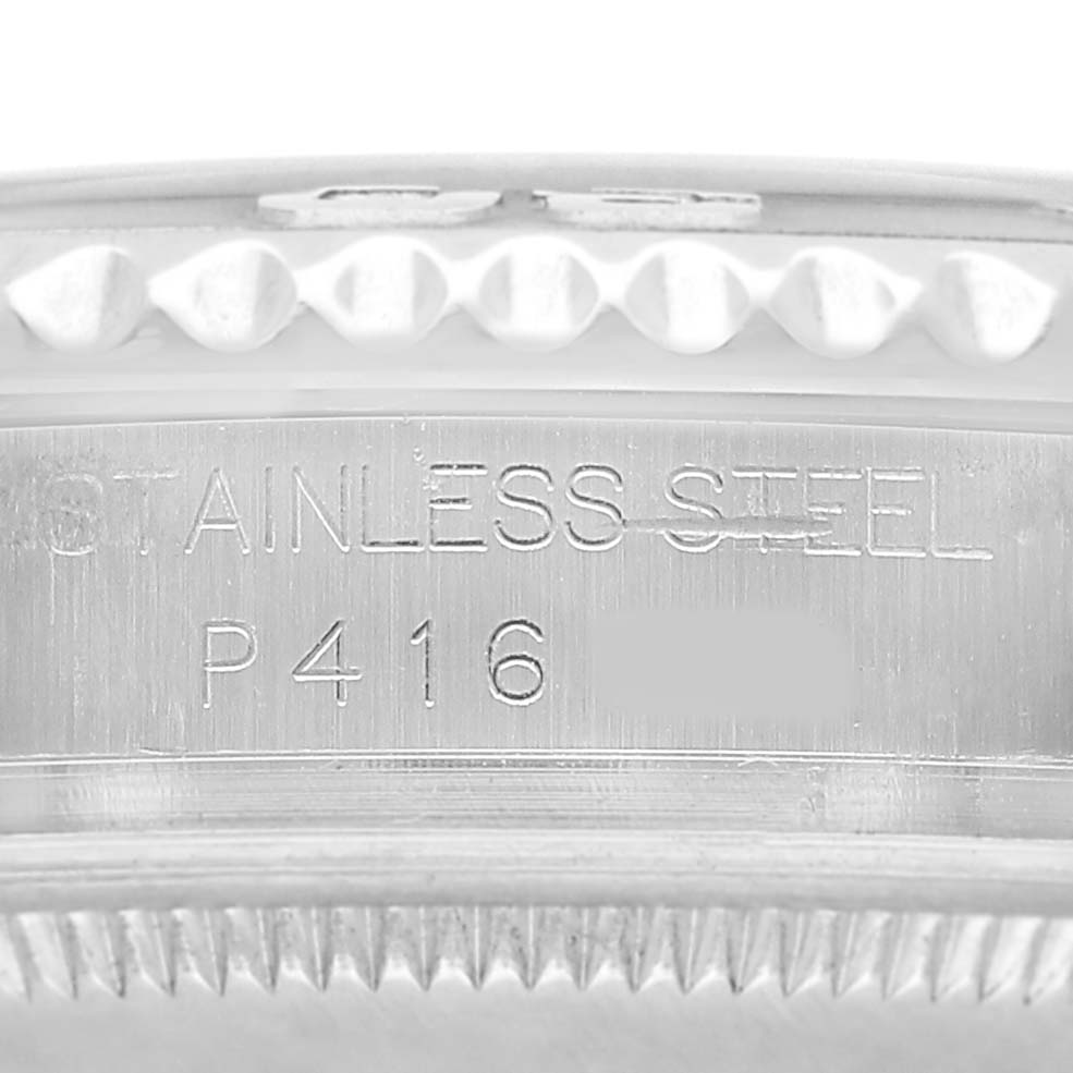 The image shows a close-up of the inner case side of the Rolex Yacht-Master 168622 Men's Stainless Steel Silver Dial, focusing on the engraving and the bezel edge.