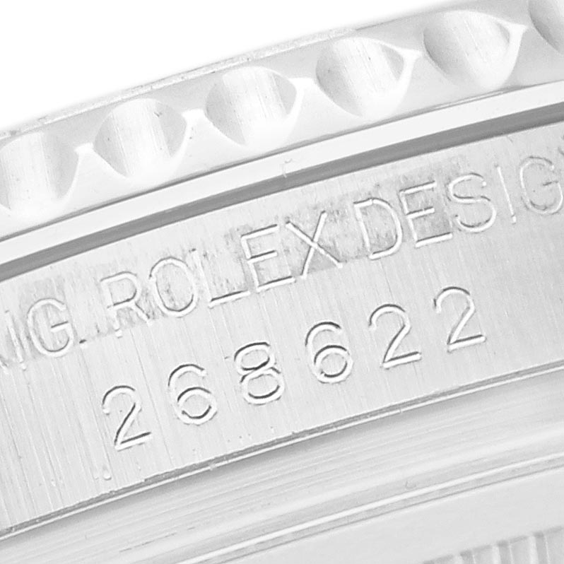 The image shows a close-up angle of the Rolex Yacht-Master 268622 Men
s Stainless Steel Green Dial 268622 Men
s Stainless Steel Green Dial
s bezel and part of the engraved case with model details.