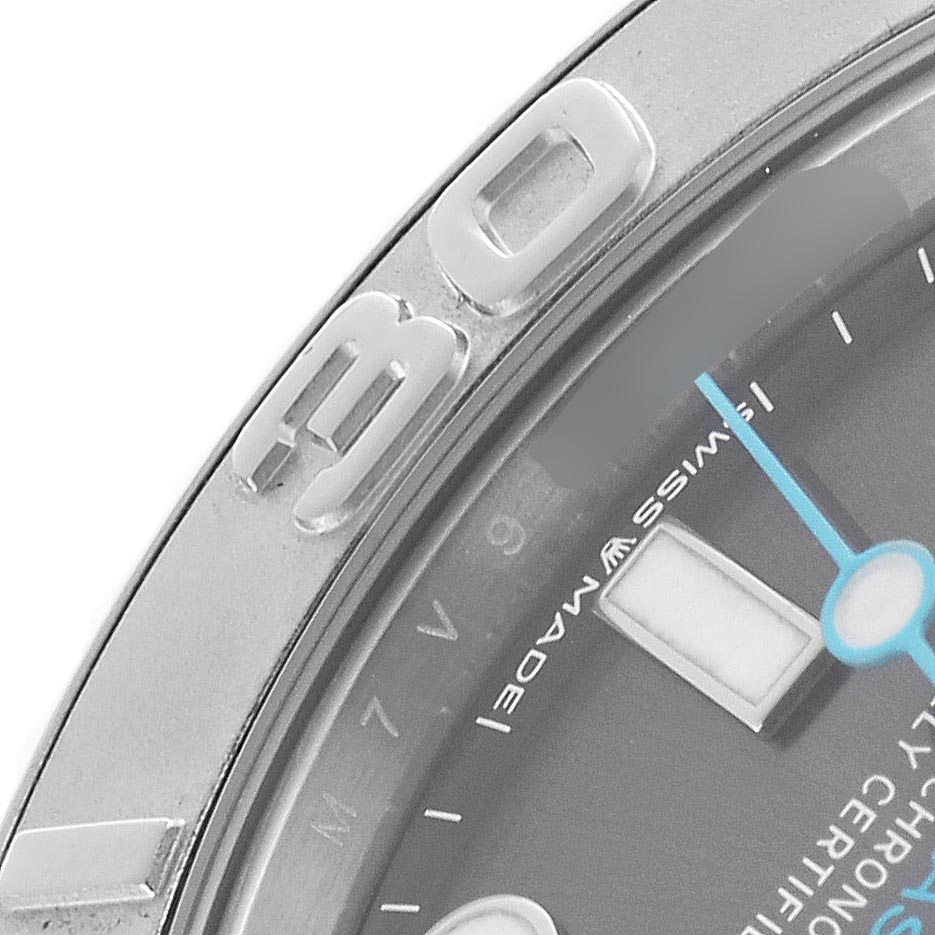 The image shows a close-up of the bezel and part of the dial with hands of a Rolex Yacht-Master 268622 Men
s Stainless Steel Green Dial 268622 Men
s Stainless Steel Green Dial watch.