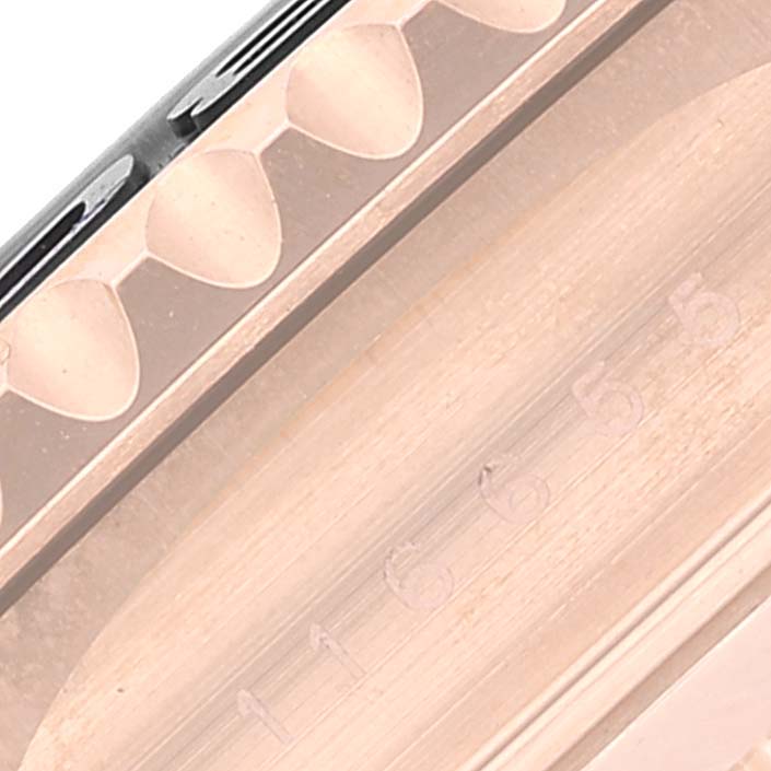 The image shows a close-up of the bezel and part of the case of a Rolex Yacht-Master 116655 Men's Rose Gold Black Dial 116655 Men's Rose Gold Black Dial watch, displaying part of its reference number.