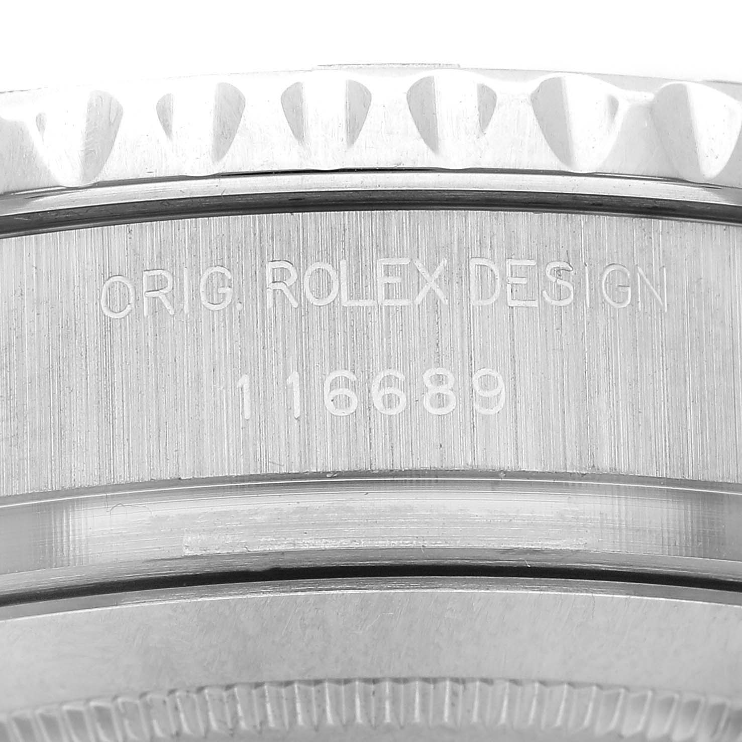 The image shows a close-up of the case side of a Rolex Yacht-Master 116689 Men's White Gold White Dial, highlighting its engraving.