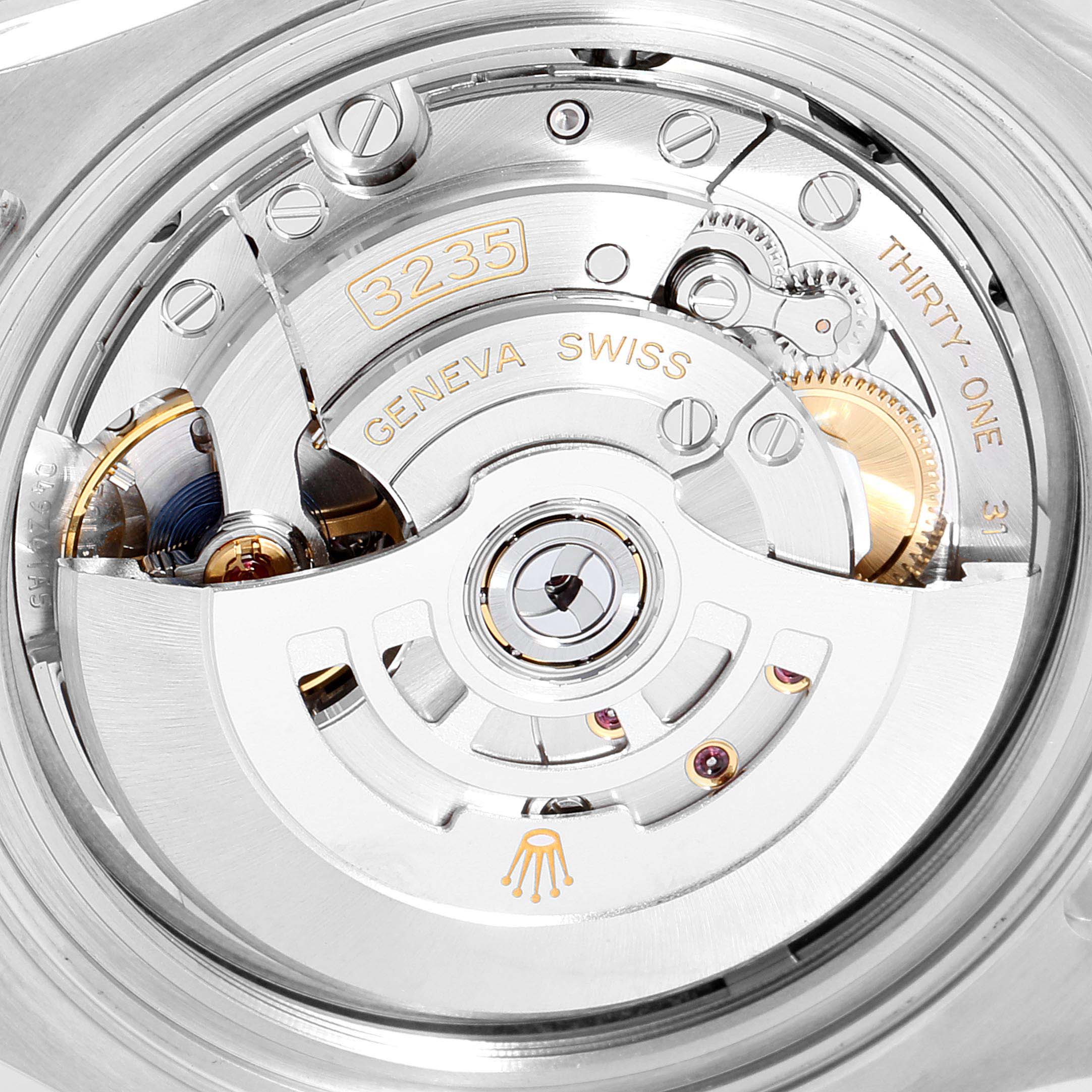 The image shows a close-up view of the Rolex Yacht-Master 126622 Men
s Stainless Steel Blue Dial 126622 Men
s Stainless Steel Blue Dial watch movement, specifically the caliber 3235 mechanism.