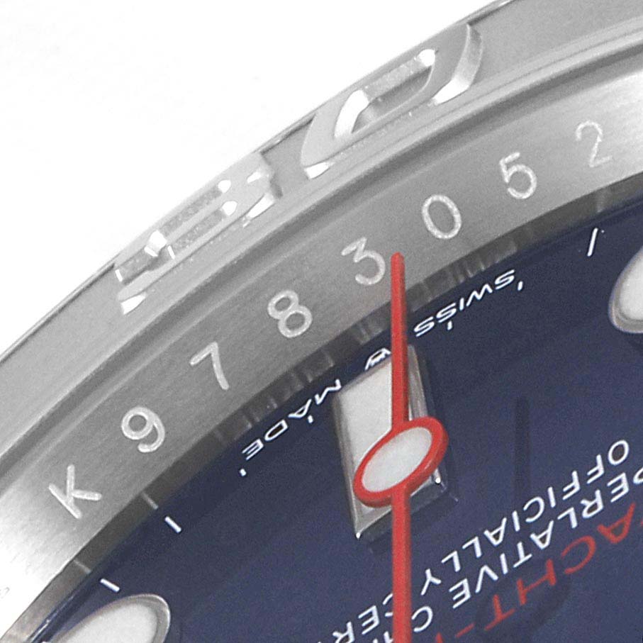 The image shows a close-up of a Rolex Yacht-Master 126622 Men
s Stainless Steel Blue Dial 126622 Men
s Stainless Steel Blue Dial watch, focusing on the bezel, part of the dial, and the red second hand.