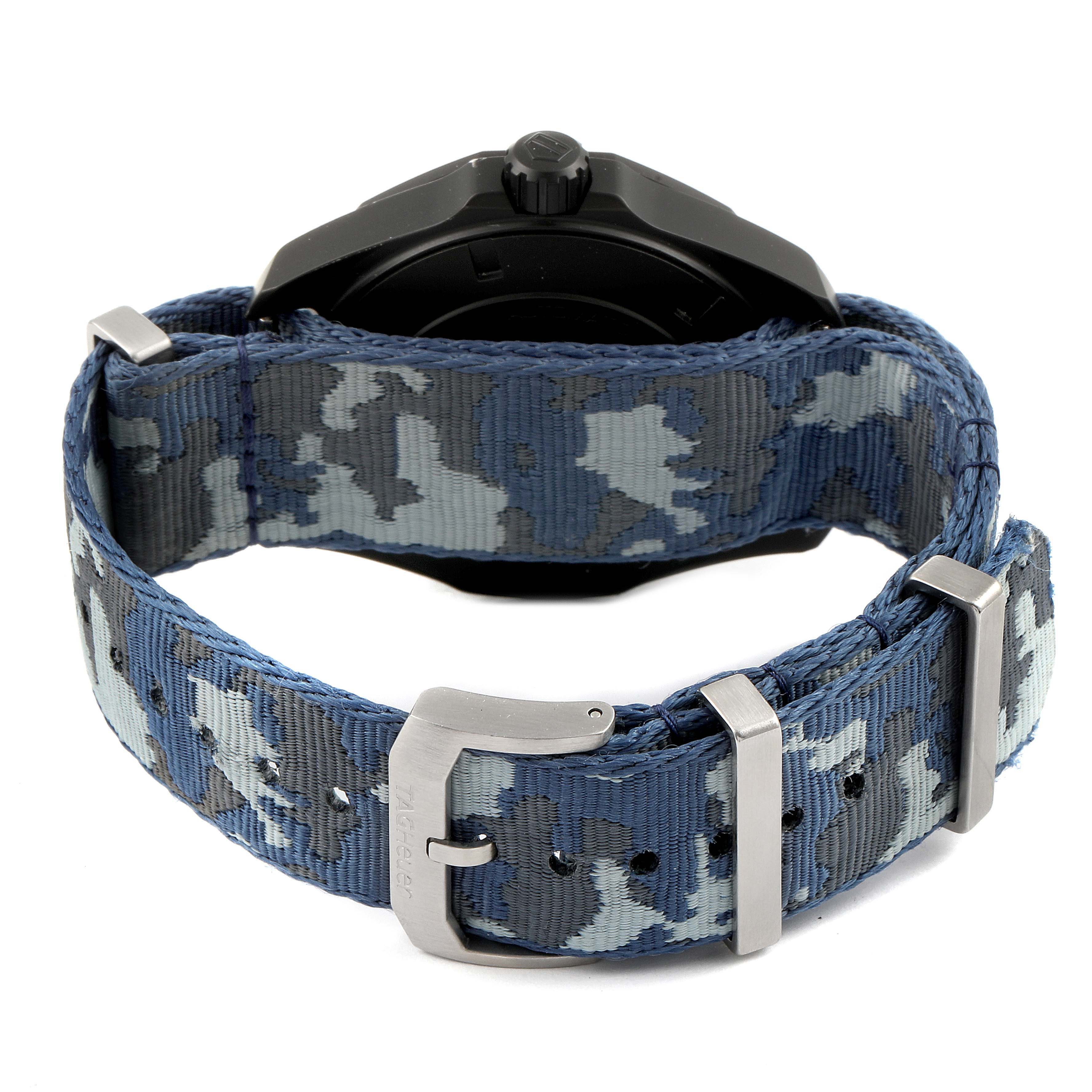 The image shows the back view of a Tag Heuer Aquaracer WAY208D.FC8221 Men's Titanium Blue Dial WAY208D.FC8221 Men's Titanium Blue Dial watch with a camo-patterned band and a buckle clasp.