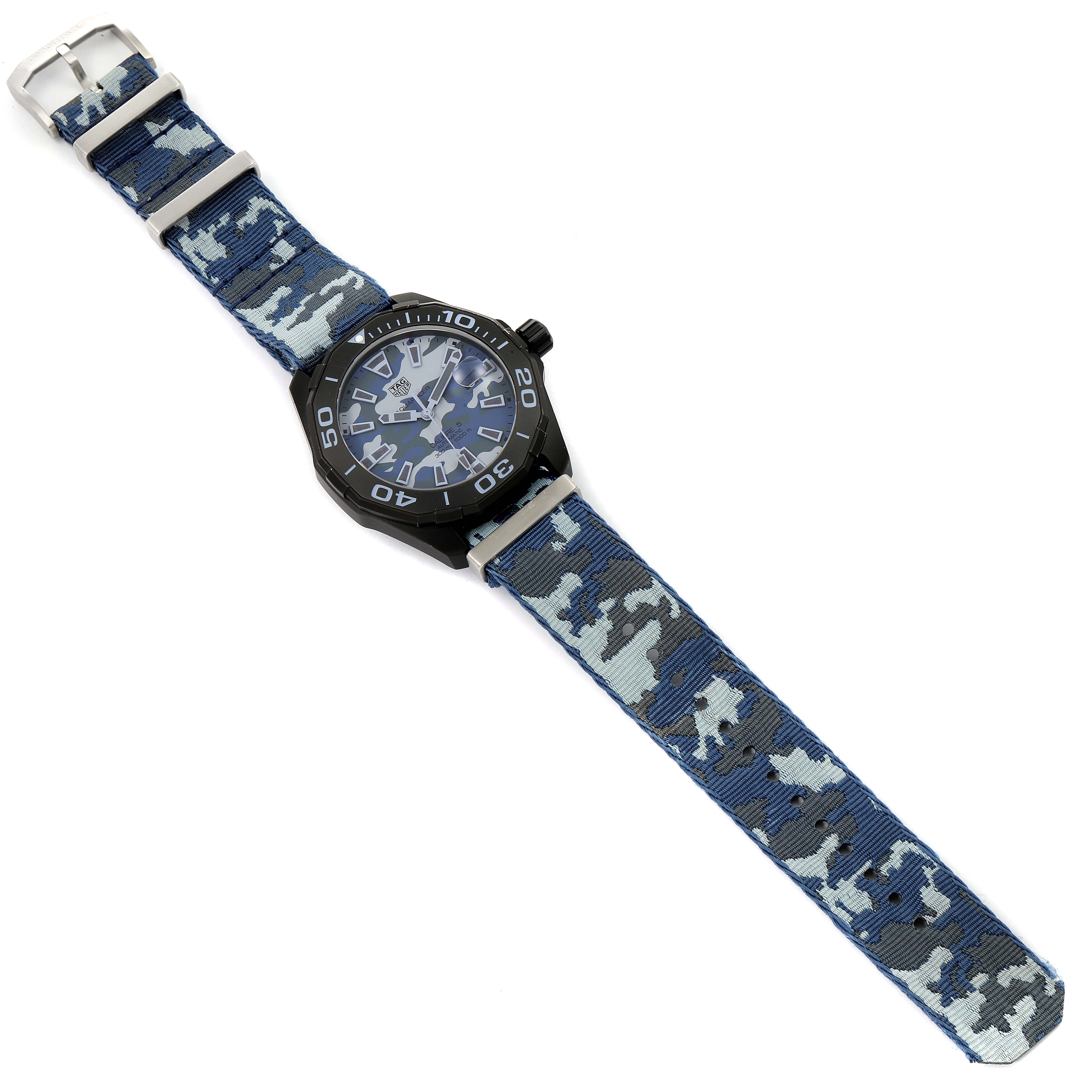 This Tag Heuer Aquaracer WAY208D.FC8221 Men's Titanium Blue Dial WAY208D.FC8221 Men's Titanium Blue Dial is shown from a top-down angle, displaying the watch face and the camouflage-patterned strap.