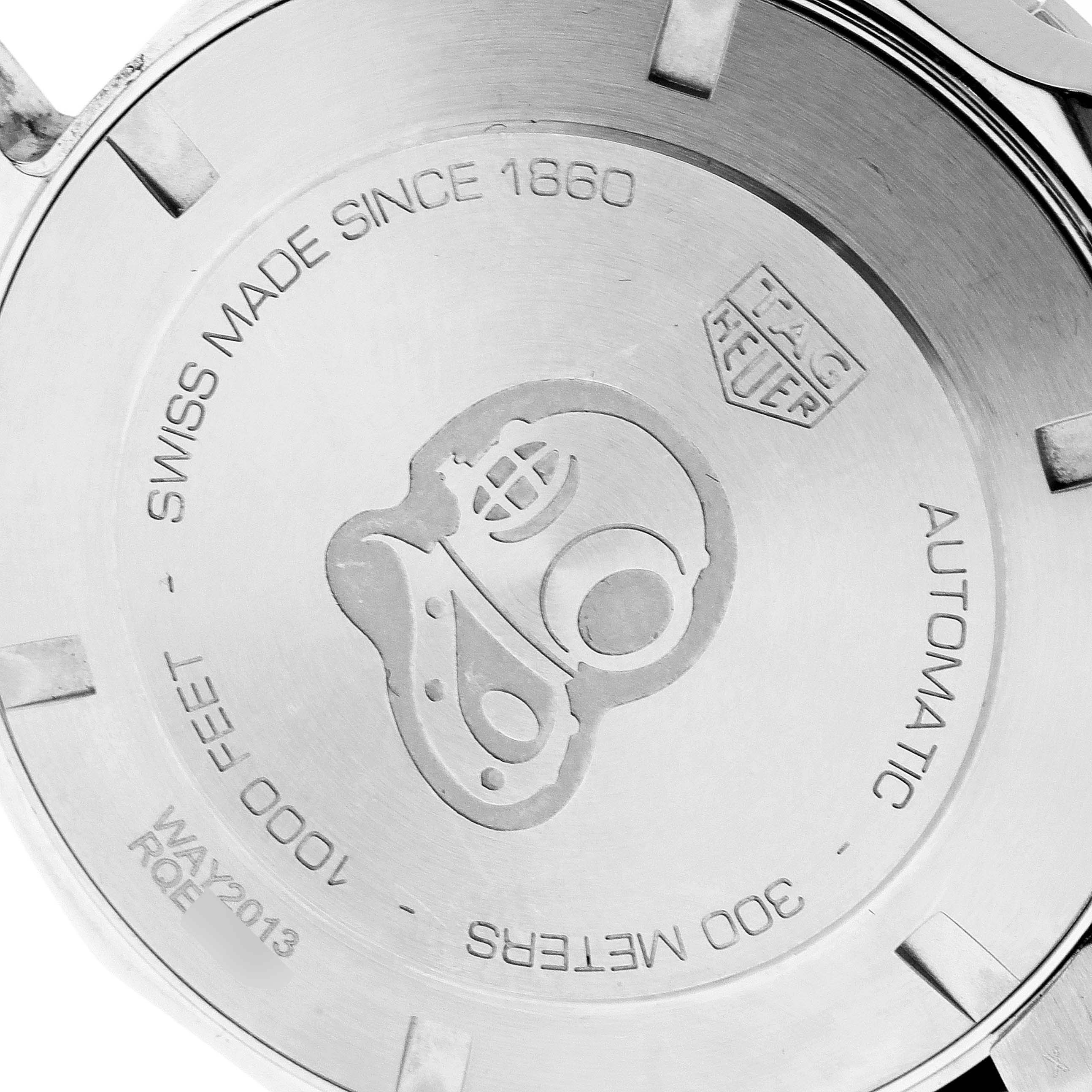 This is the back of the Tag Heuer Aquaracer WAY2013.BA0927 Men's Stainless Steel White Dial WAY2013.BA0927 Men's Stainless Steel White Dial watch showing engravings and branding.