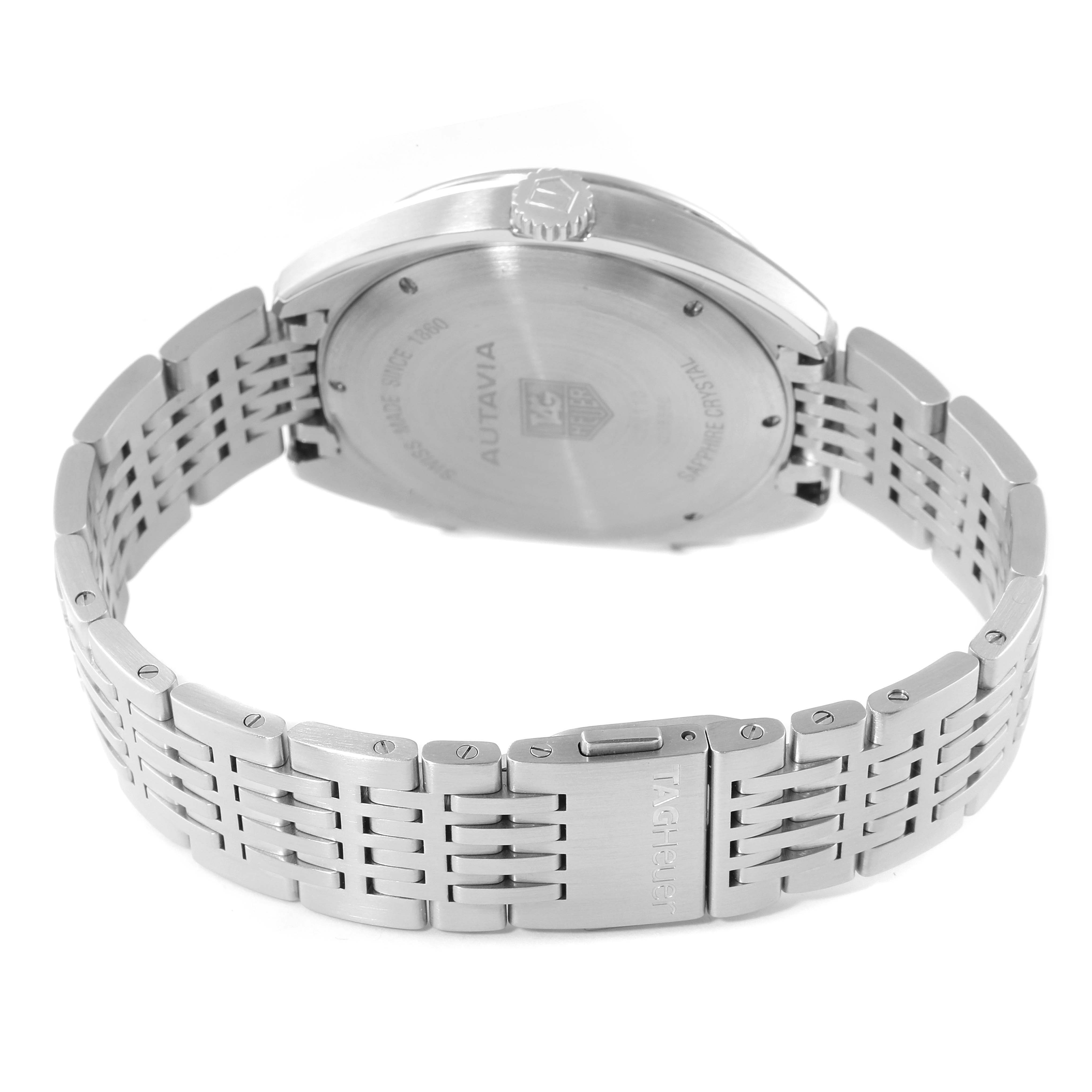 The image shows the back view of a Tag Heuer Autavia CY2110 Men's Stainless Steel White Dial CY2110 Men's Stainless Steel White Dial watch, highlighting its case back and metal bracelet with clasp.