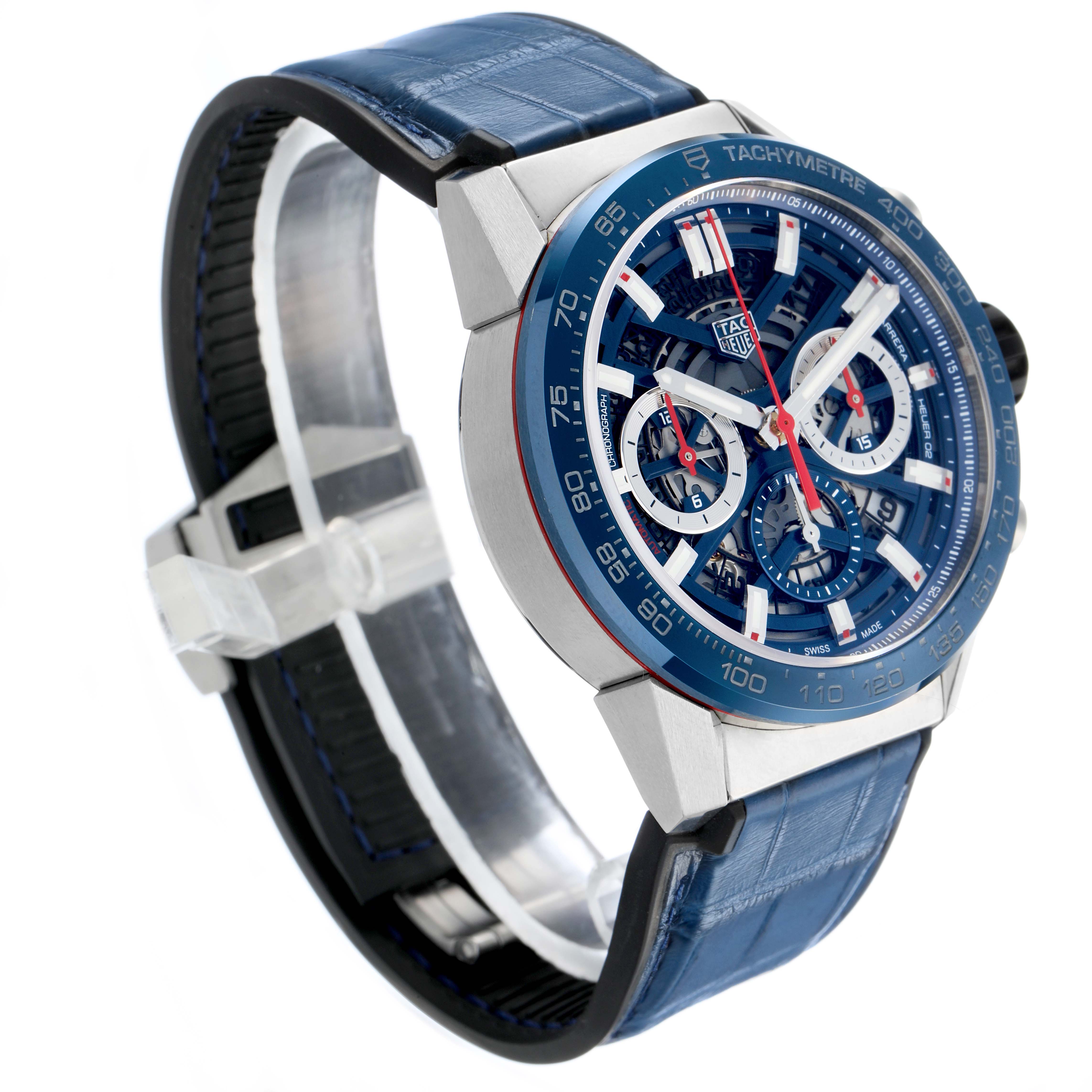 The Tag Heuer Carrera CBG2011 Men's Stainless Steel Blue Dial watch is shown from a three-quarter angle, highlighting the blue strap, bezel, and chronograph dials.