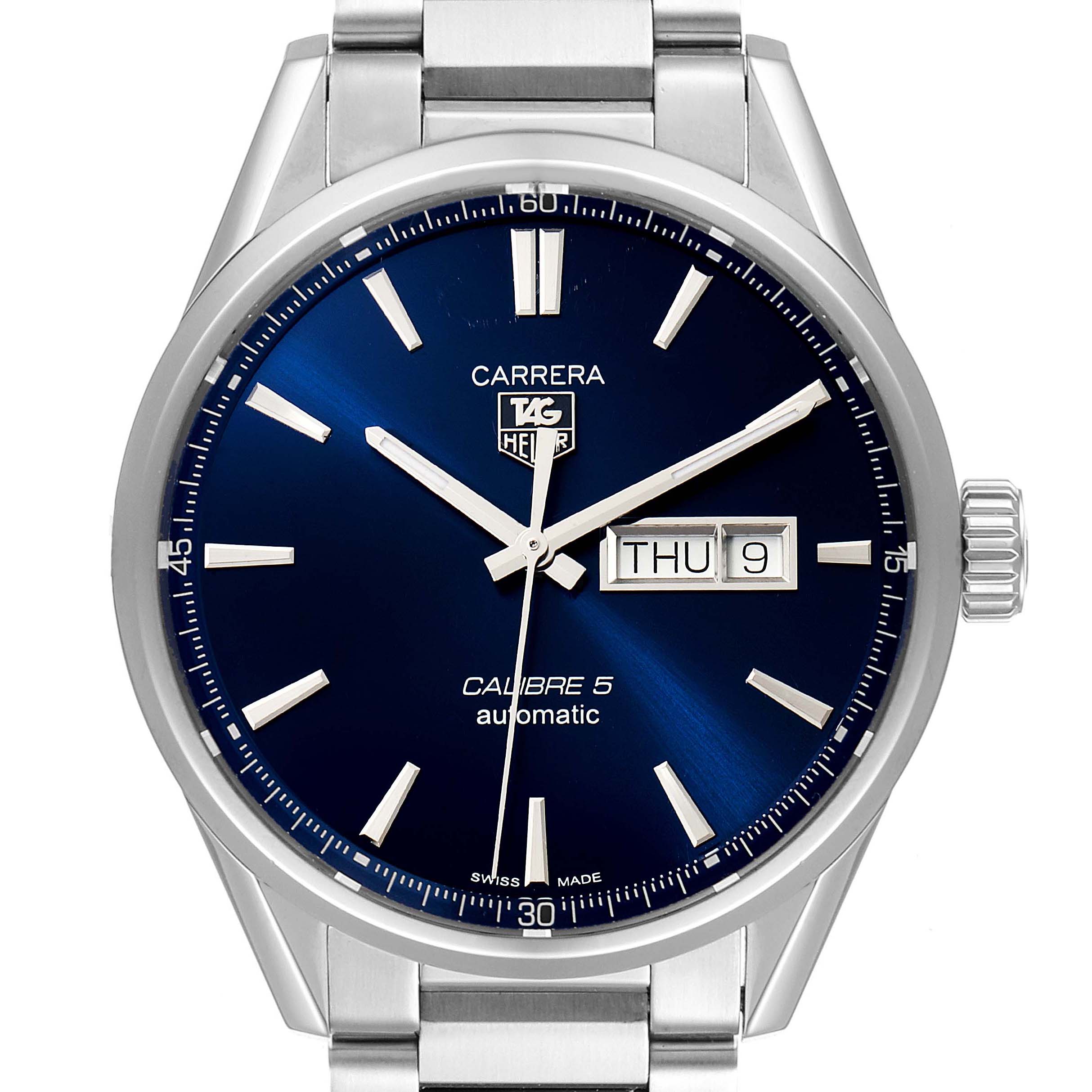 The image shows a front angle of the Tag Heuer Carrera WAR201E.BA0723 Men's Stainless Steel Blue Dial WAR201E.BA0723 Men's Stainless Steel Blue Dial model watch, highlighting its blue dial, day-date display, and stainless steel bracelet.